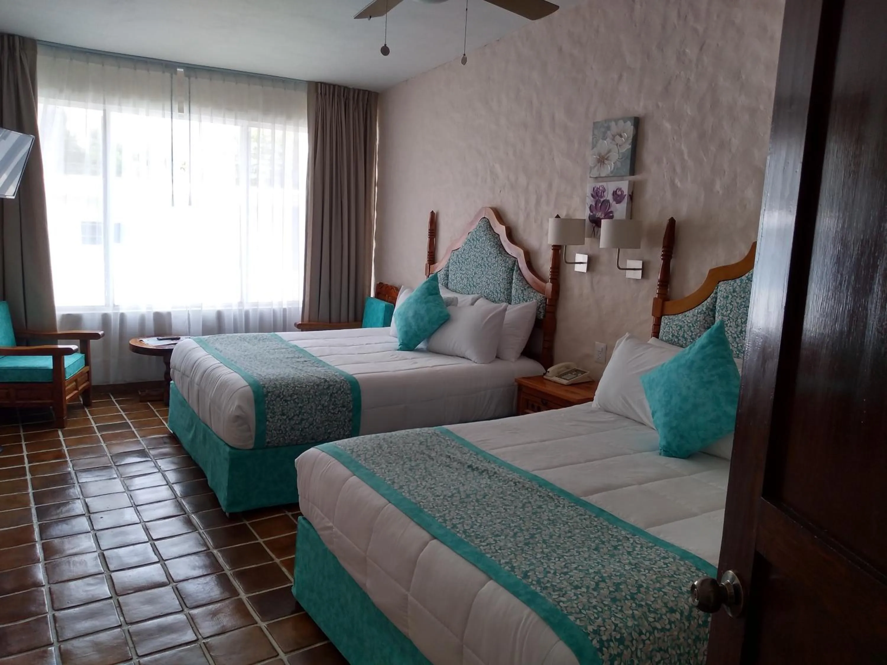 Photo of the whole room, Bed in Hotel Posada Quinta Las Flores