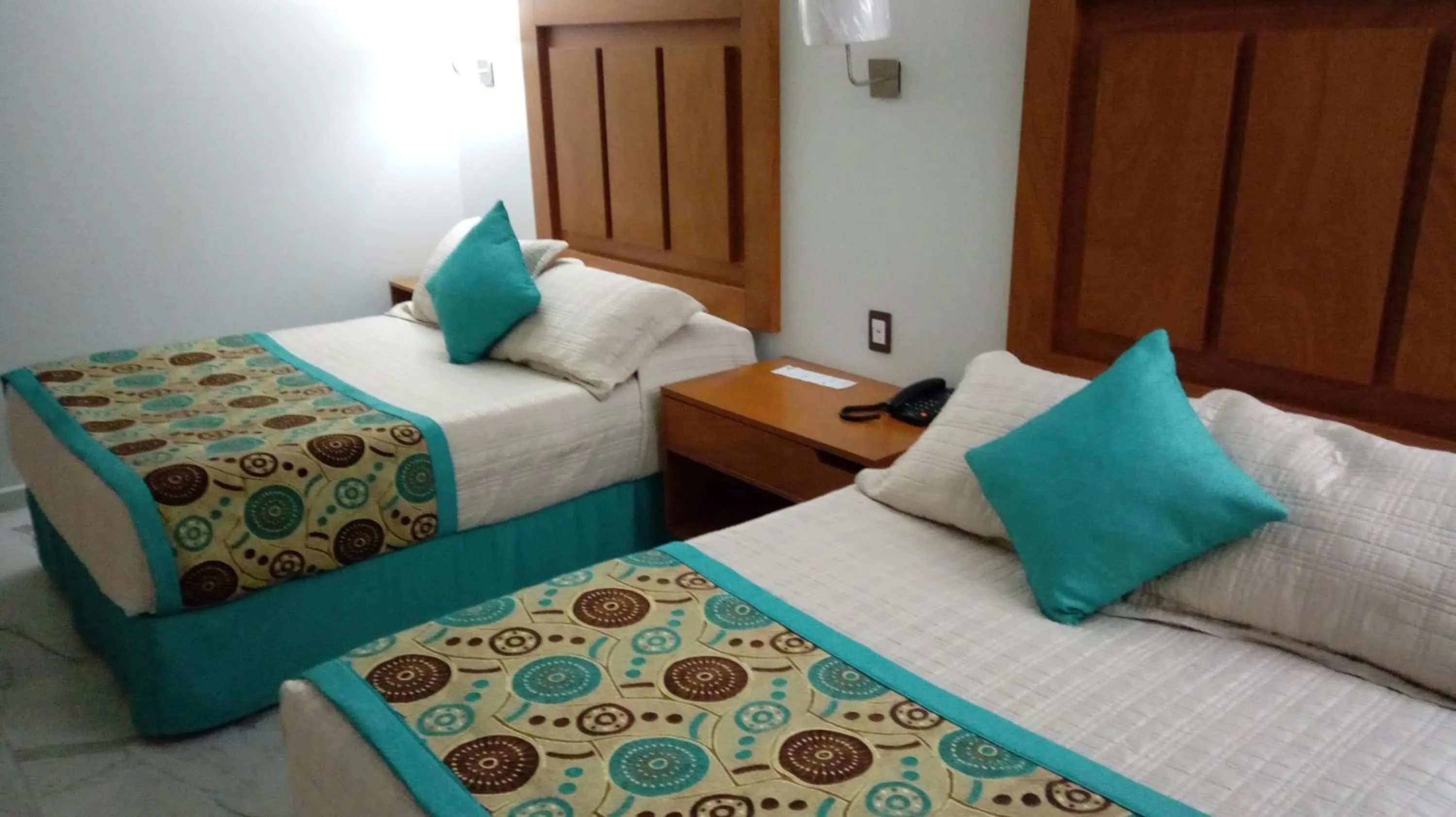 Bed in Hotel Posada Quinta Las Flores