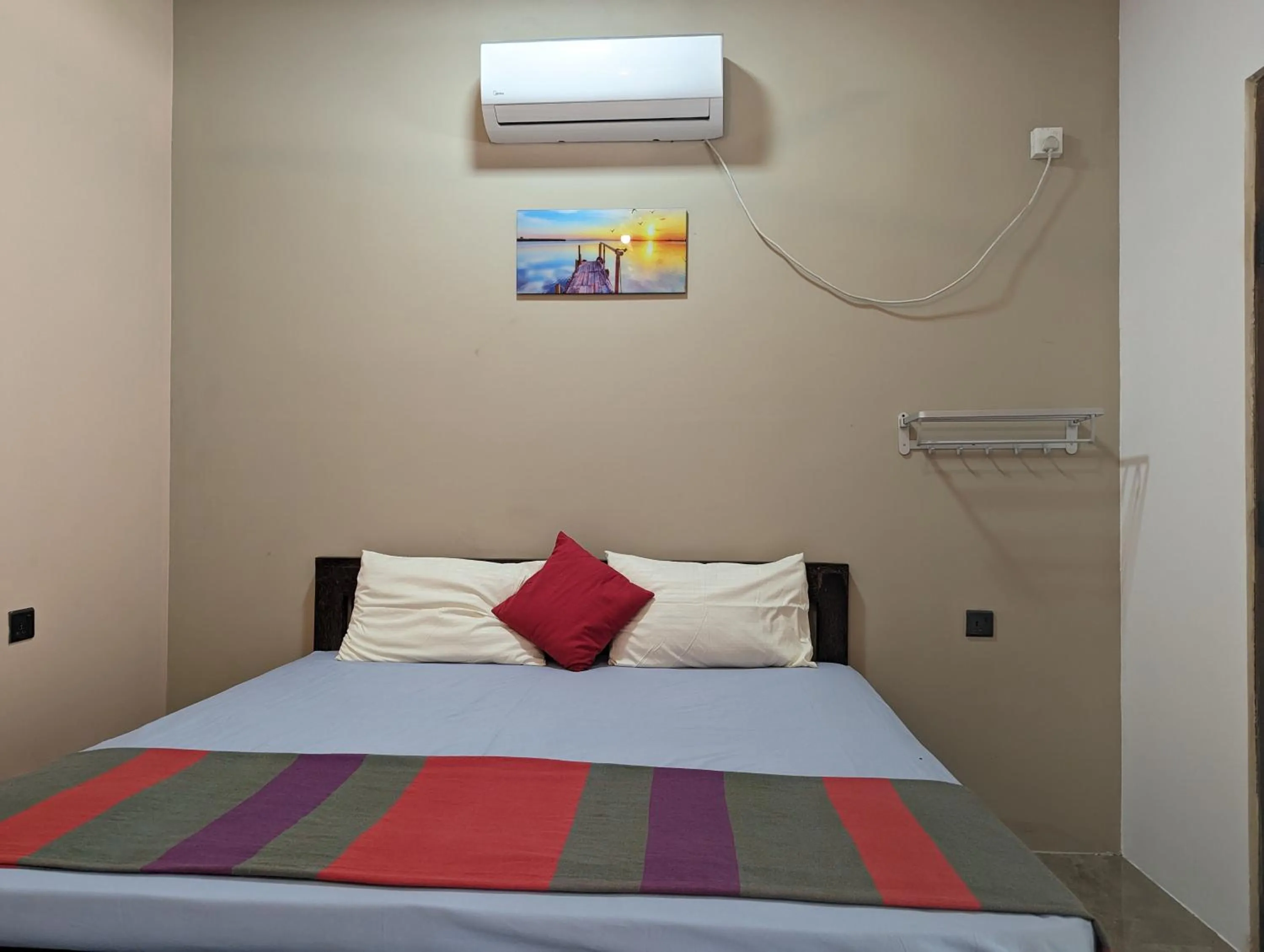 Deluxe Double Room (2 Adults + 1 Child) - single occupancy in Aiden Homestay