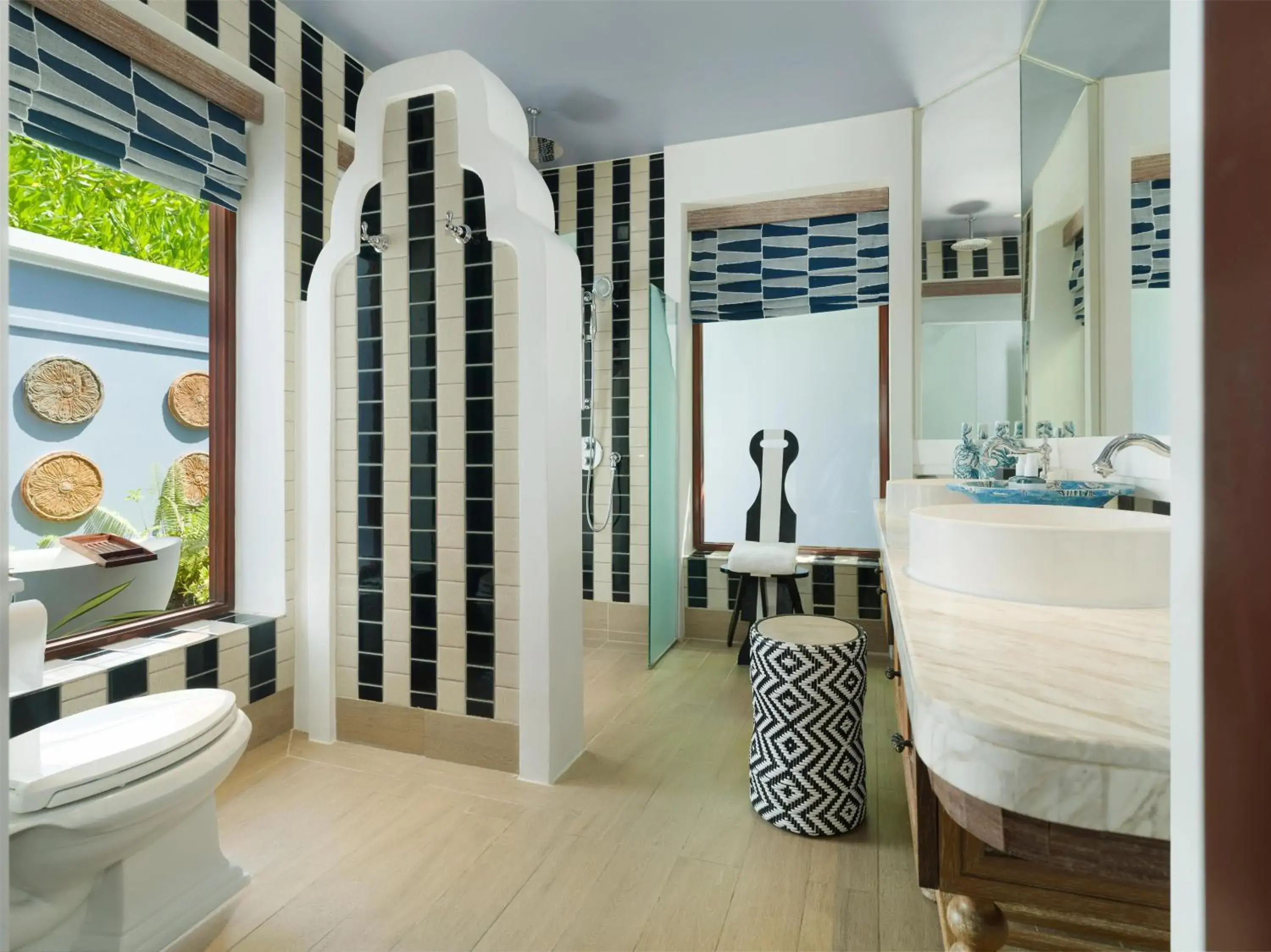 Bathroom in SAii Lagoon Maldives, Curio Collection By Hilton Bathroom in SAii Lagoon Maldives, Curio Collection By Hilton