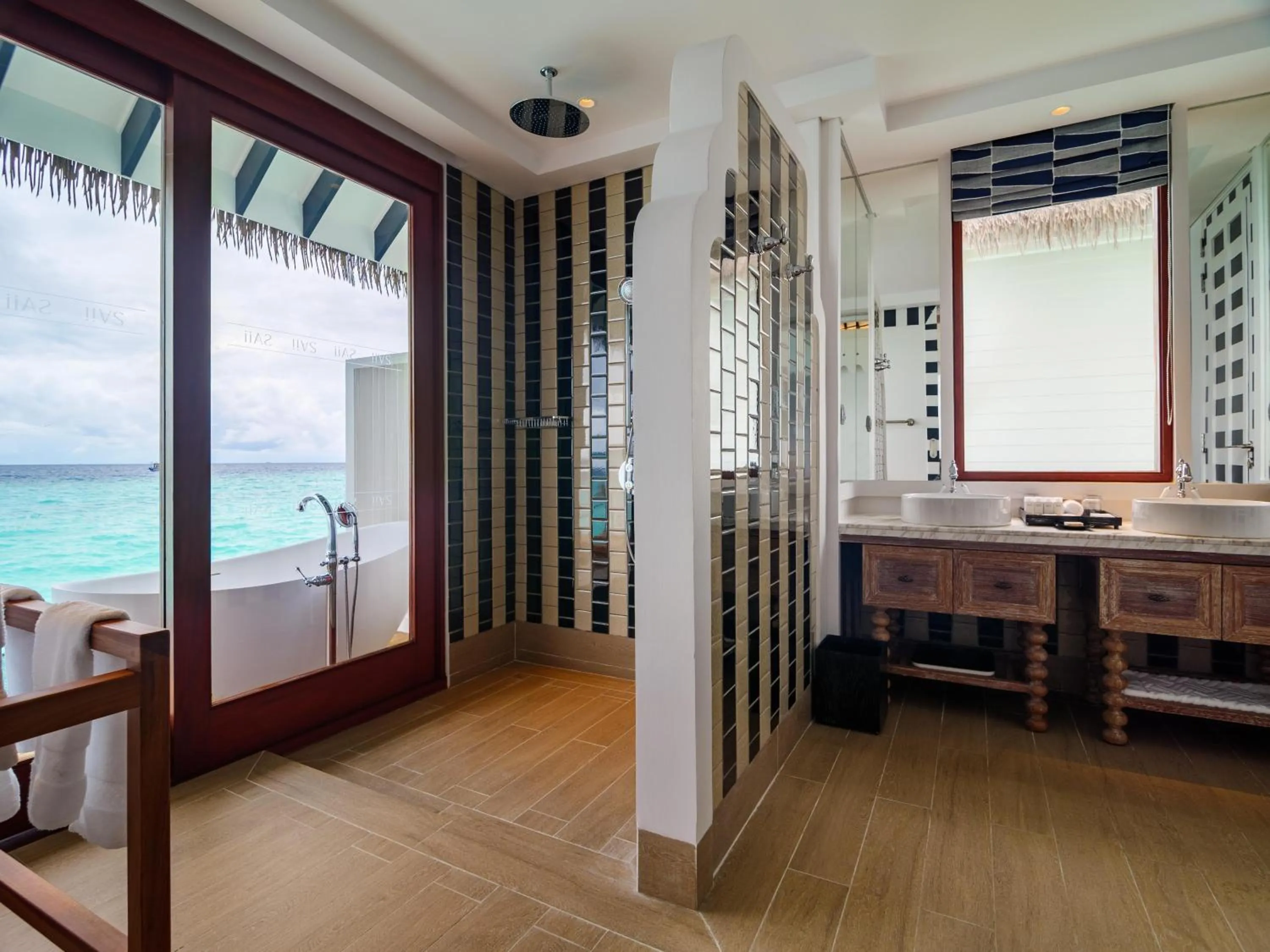 Bathroom in SAii Lagoon Maldives, Curio Collection By Hilton