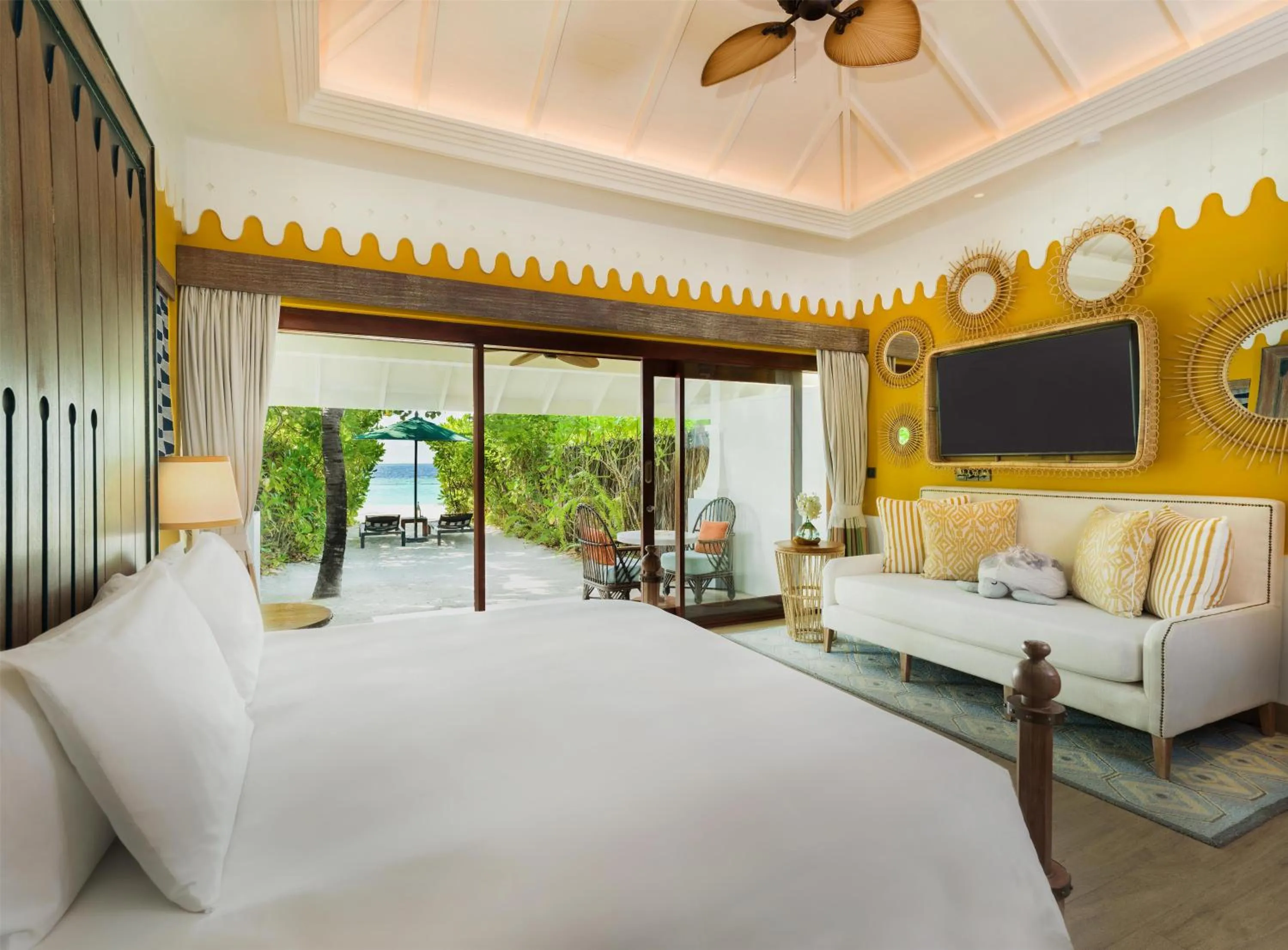 Living room, Bed in SAii Lagoon Maldives, Curio Collection By Hilton