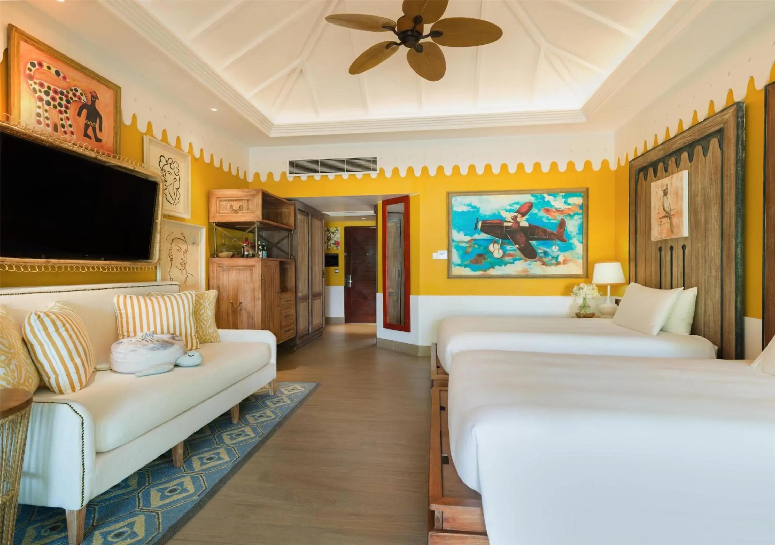 Living room, Bed in SAii Lagoon Maldives, Curio Collection By Hilton Living room, Bed in SAii Lagoon Maldives, Curio Collection By Hilton