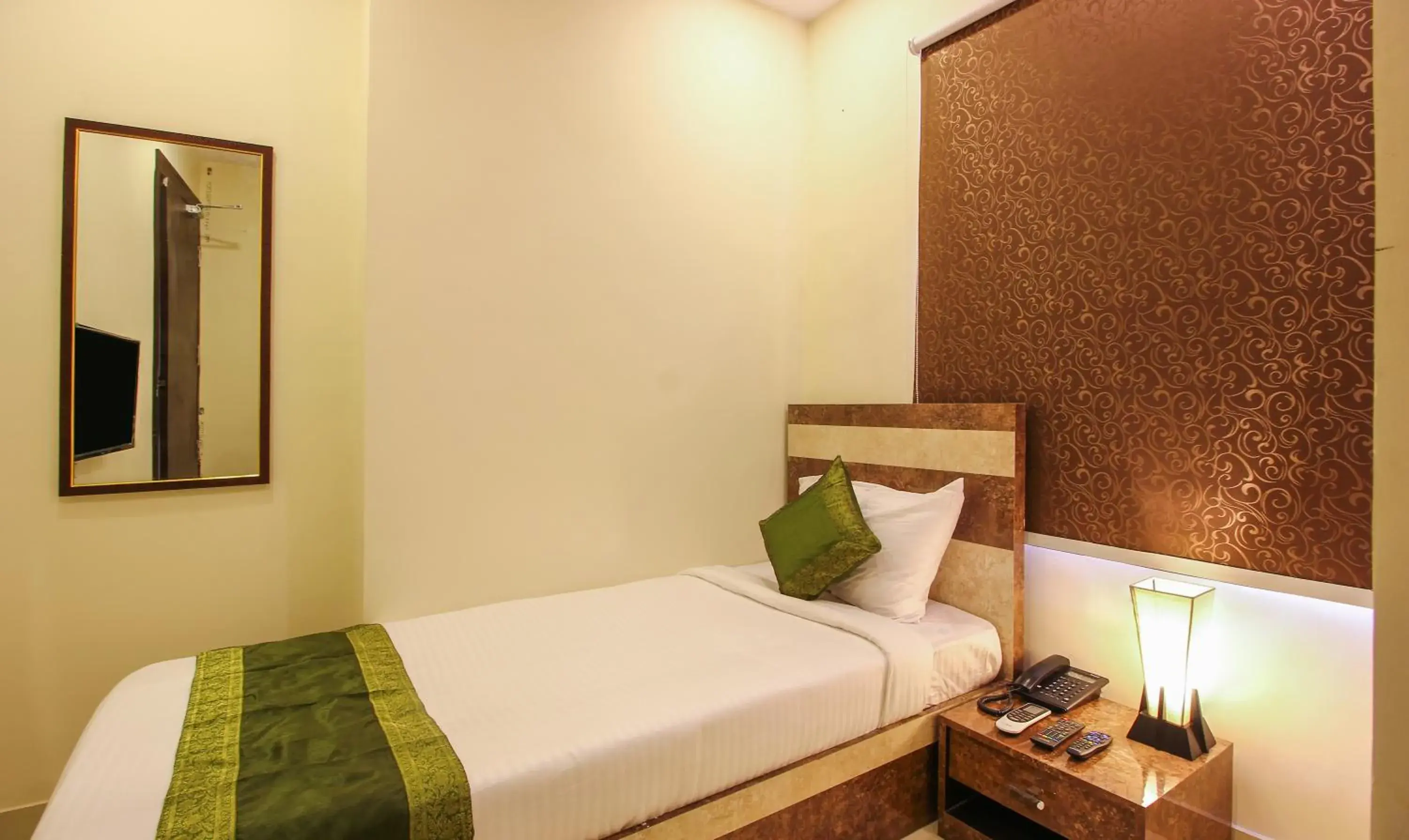 Bedroom, Bed in Treebo Address Inn, Banjara Hills Bedroom, Bed in Treebo Address Inn, Banjara Hills