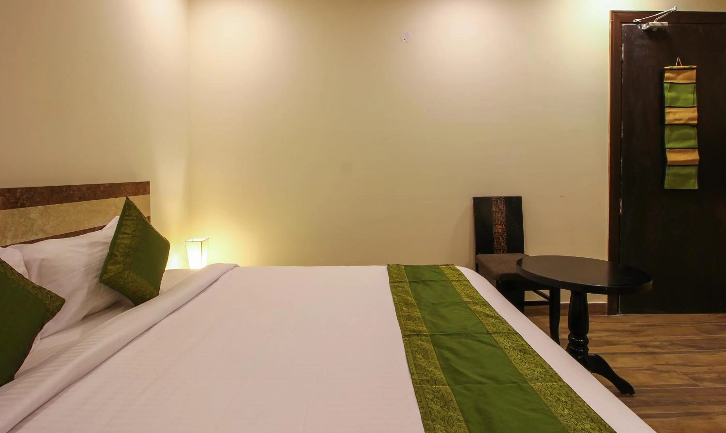 Bedroom, Bed in Treebo Address Inn, Banjara Hills