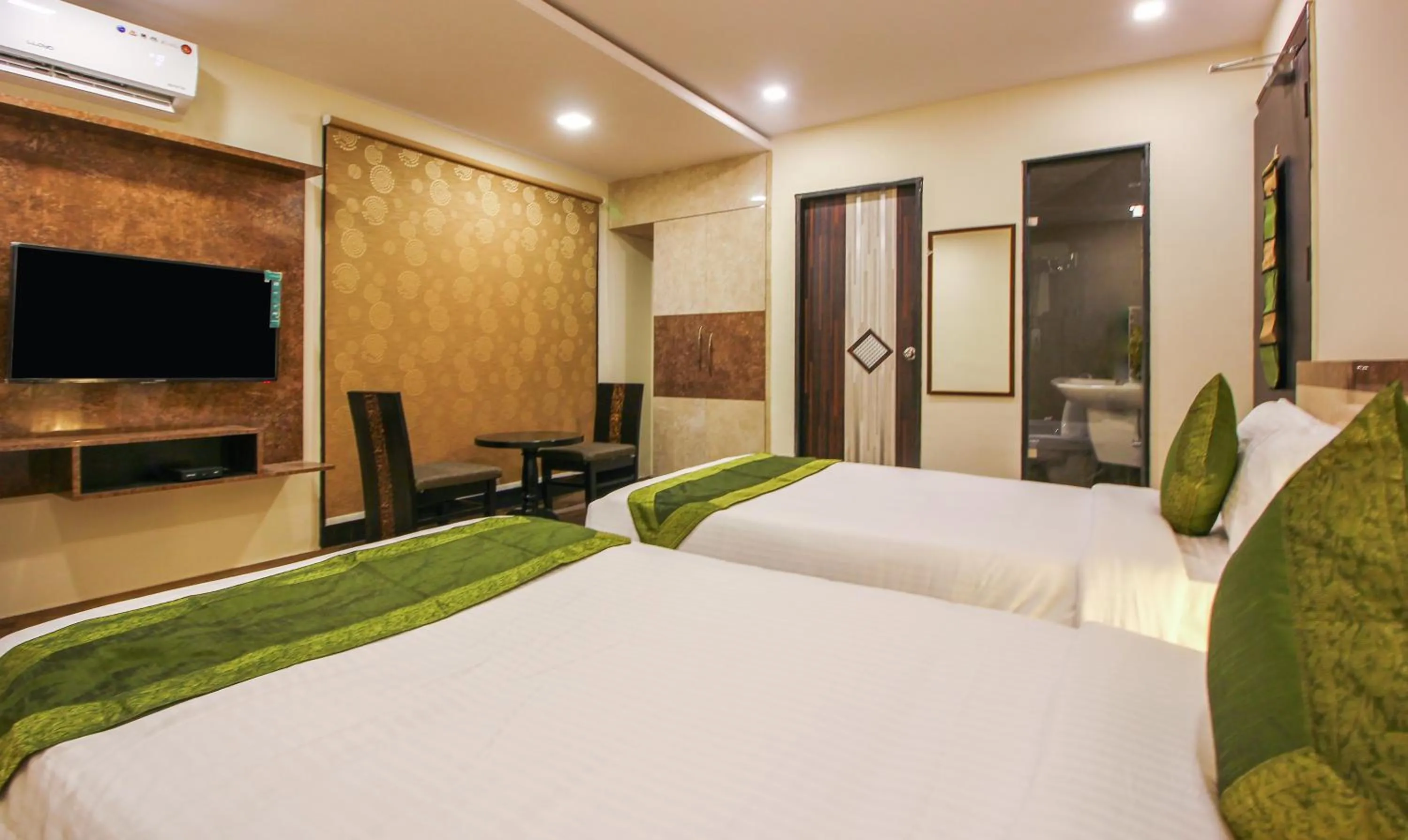 Photo of the whole room, Bed in Treebo Address Inn, Banjara Hills