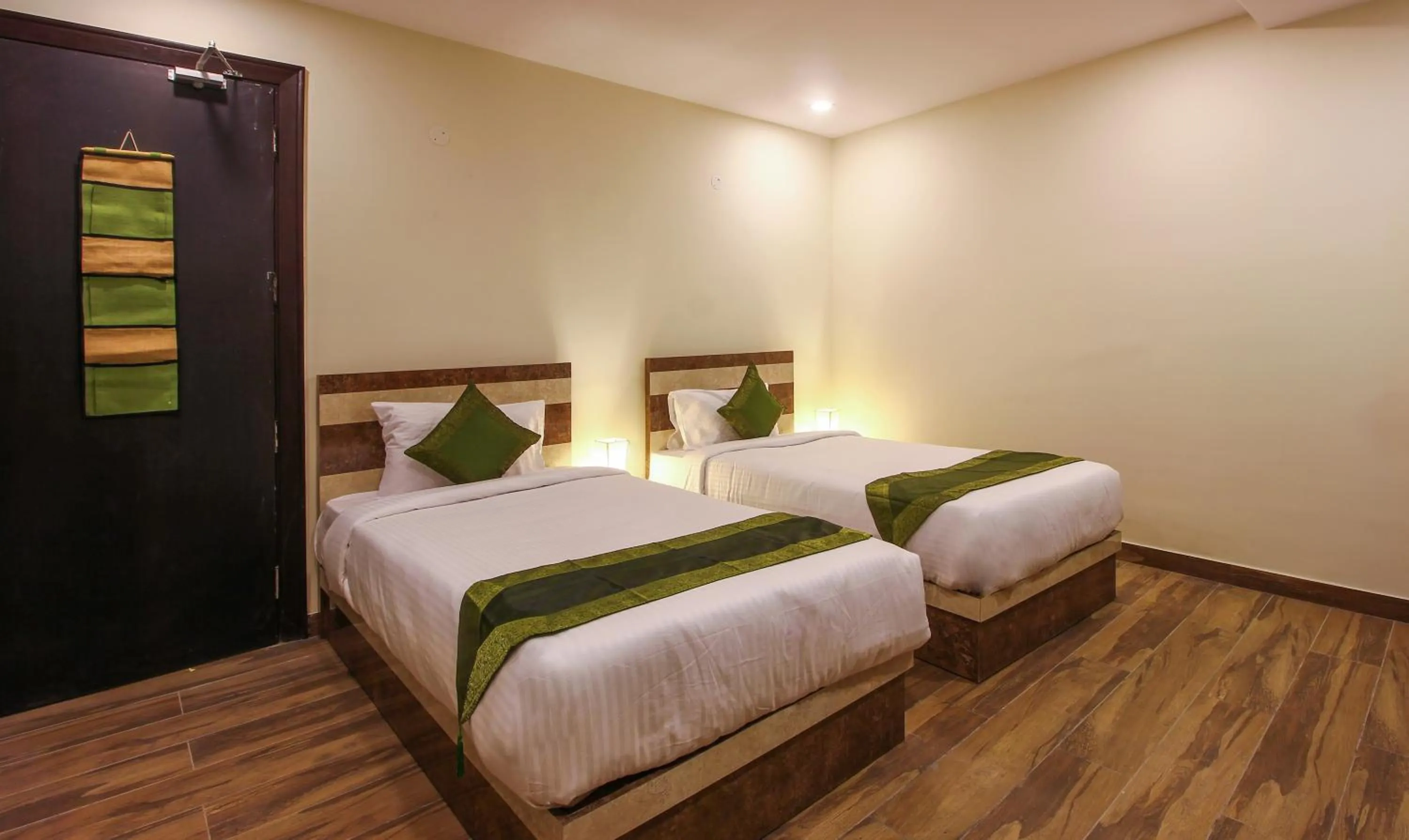 Bedroom, Bed in Treebo Address Inn, Banjara Hills