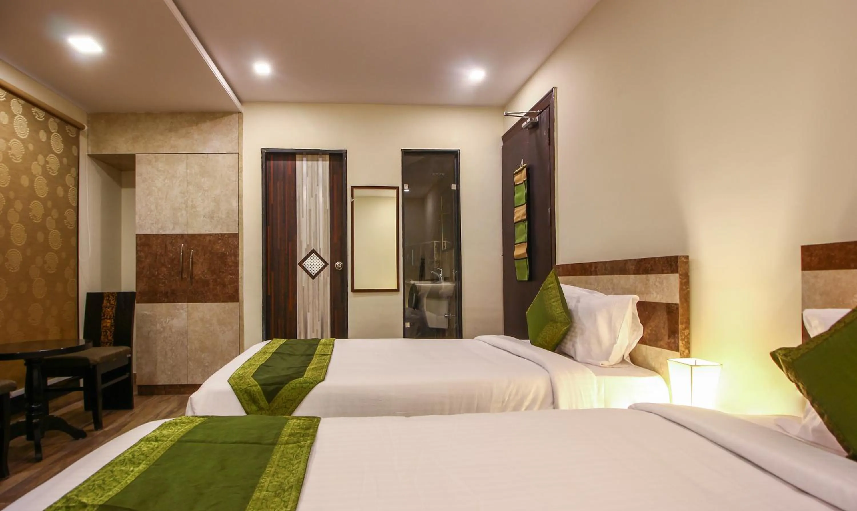 Photo of the whole room, Bed in Treebo Address Inn, Banjara Hills