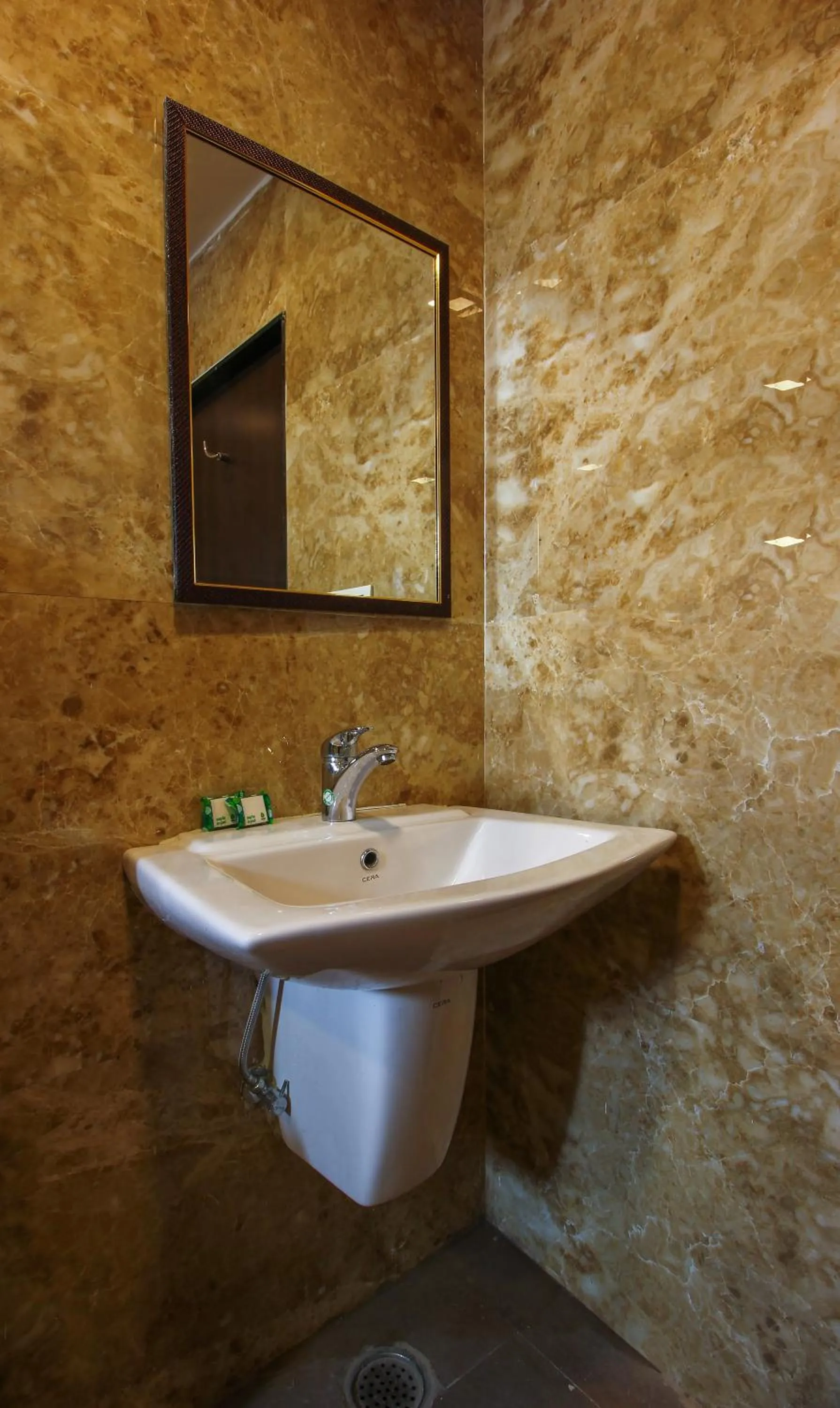 Bathroom in Treebo Address Inn, Banjara Hills
