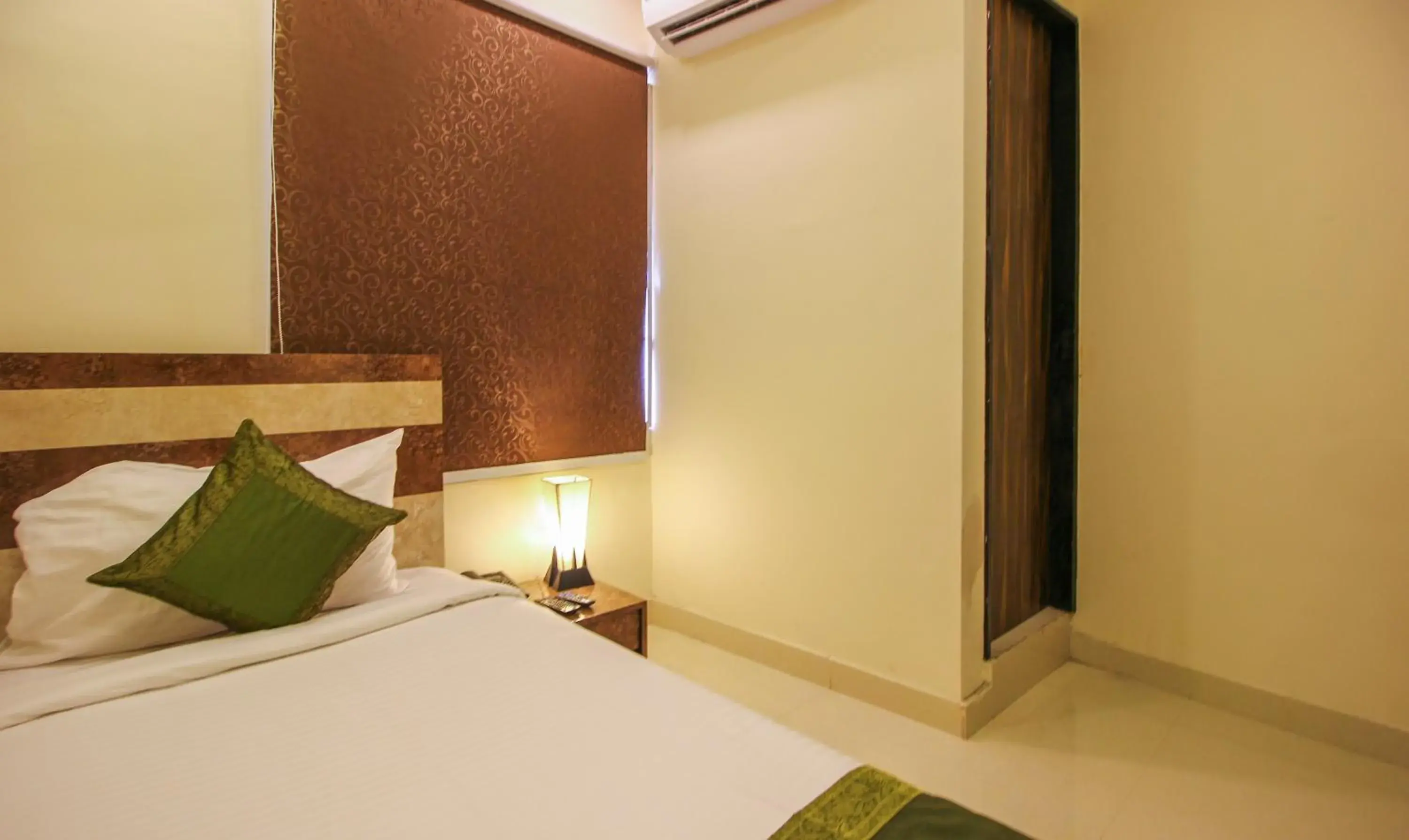 Bedroom, Bed in Treebo Address Inn, Banjara Hills Bedroom, Bed in Treebo Address Inn, Banjara Hills