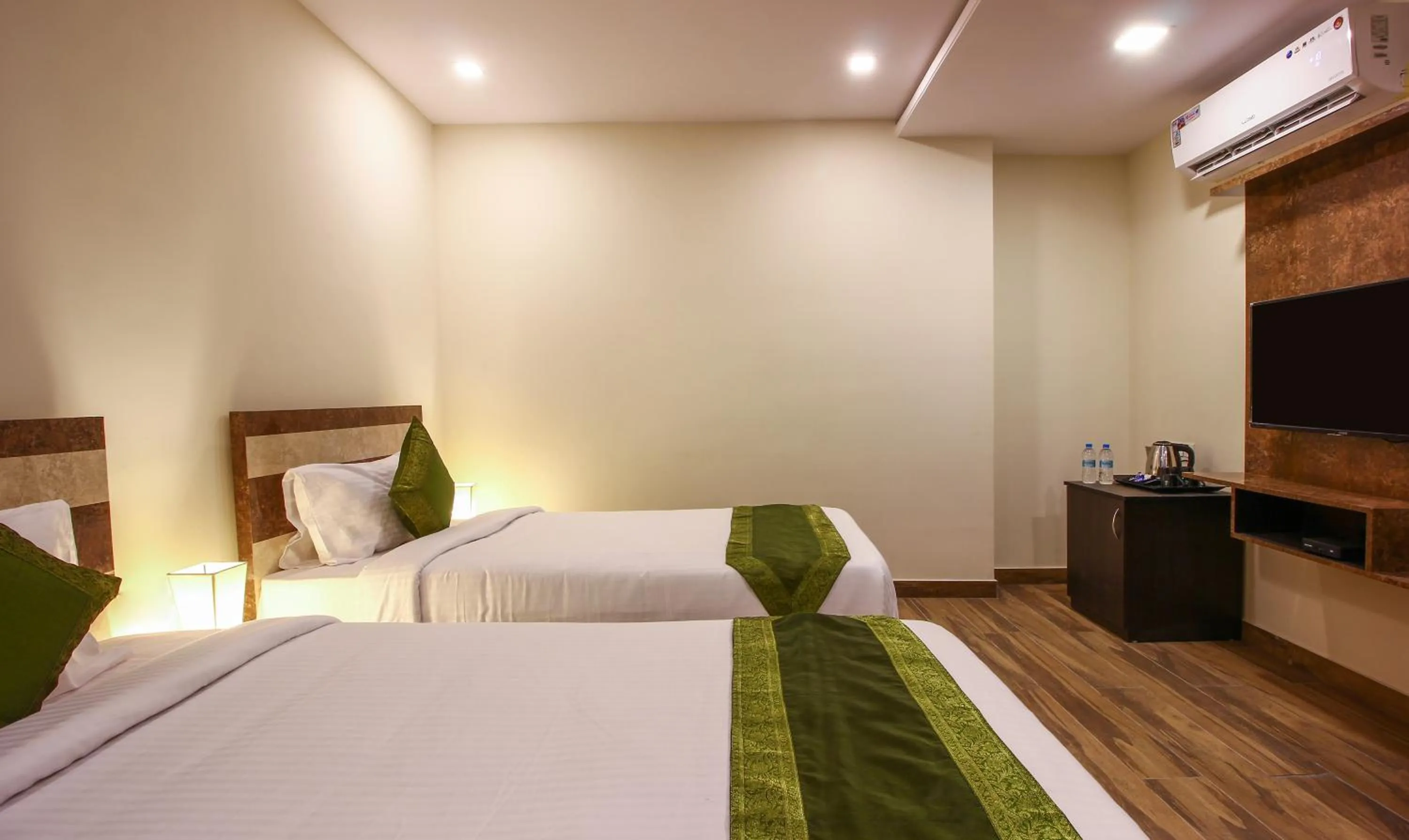 Bedroom, Bed in Treebo Address Inn, Banjara Hills