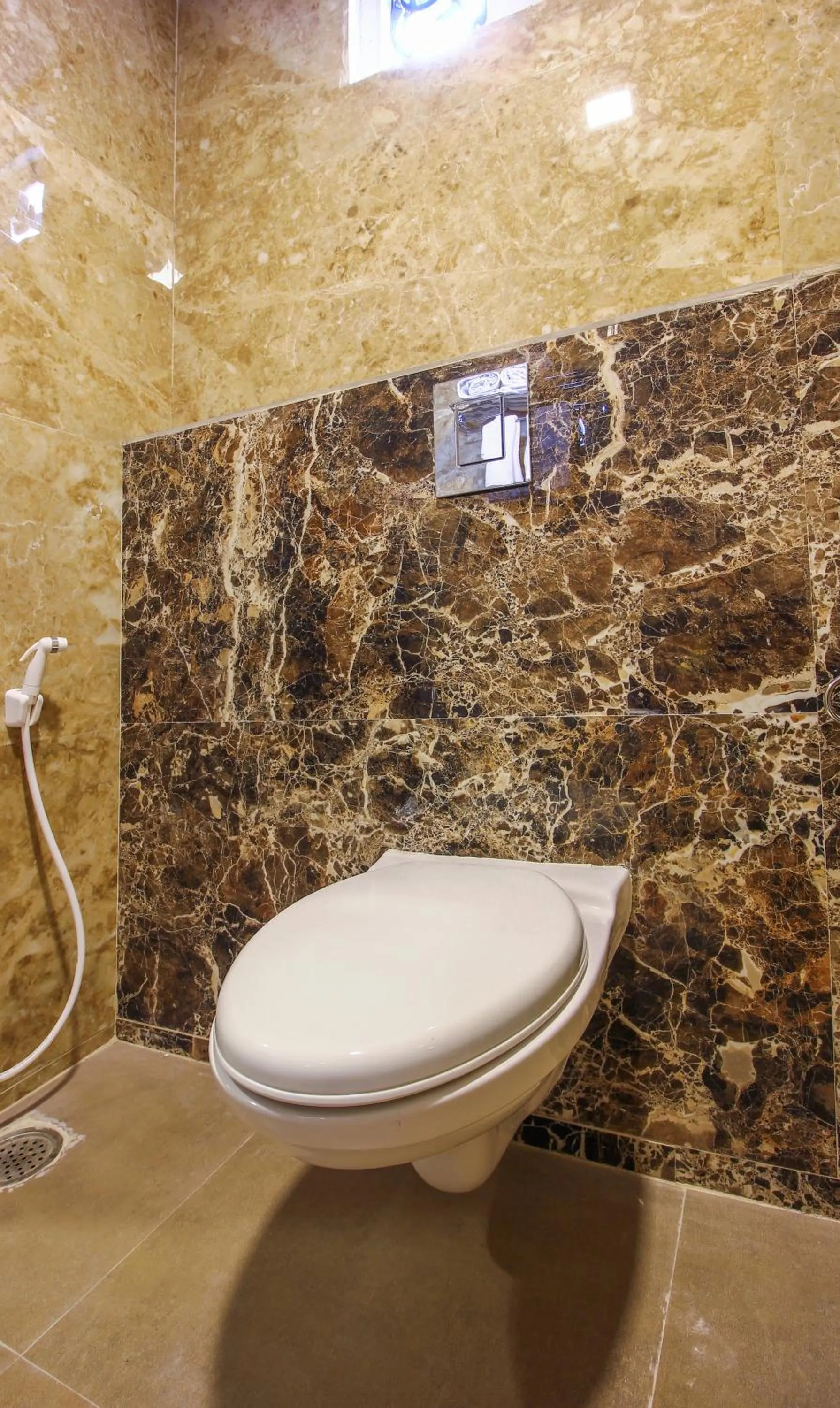 Toilet in Treebo Address Inn, Banjara Hills