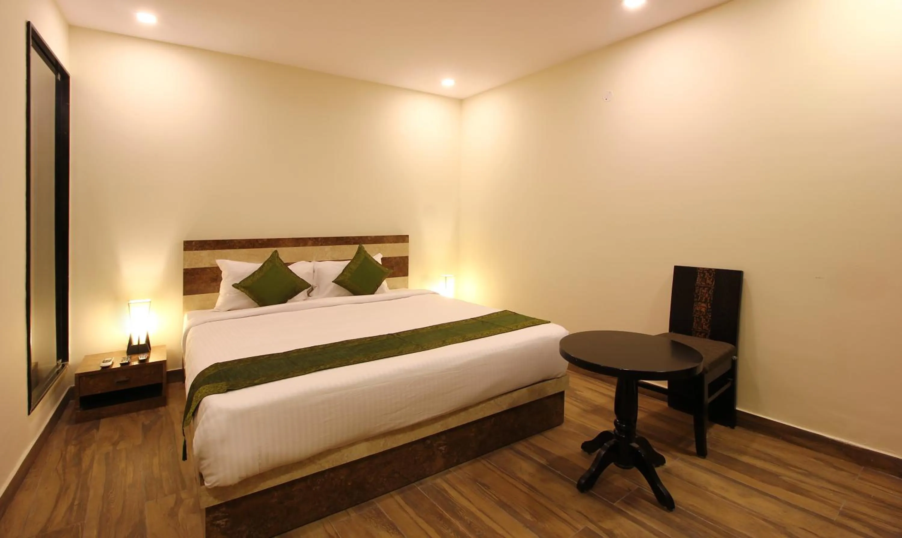 Bedroom, Bed in Treebo Address Inn, Banjara Hills