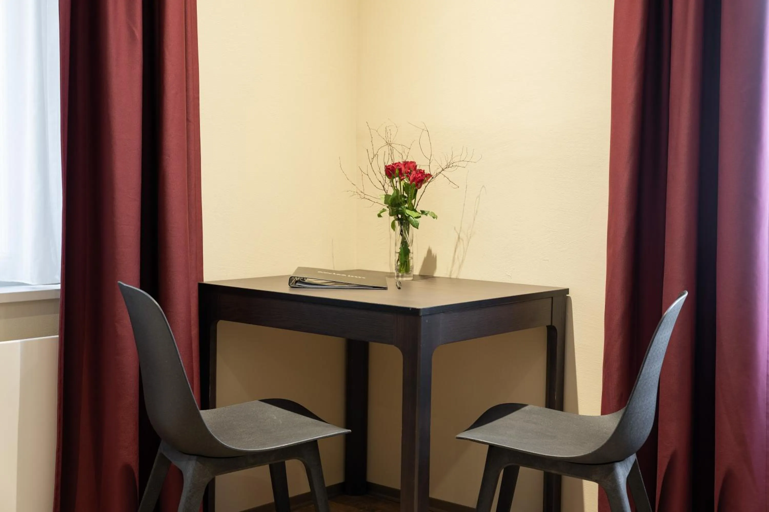 Dining area in Swiss Inn & Apartments