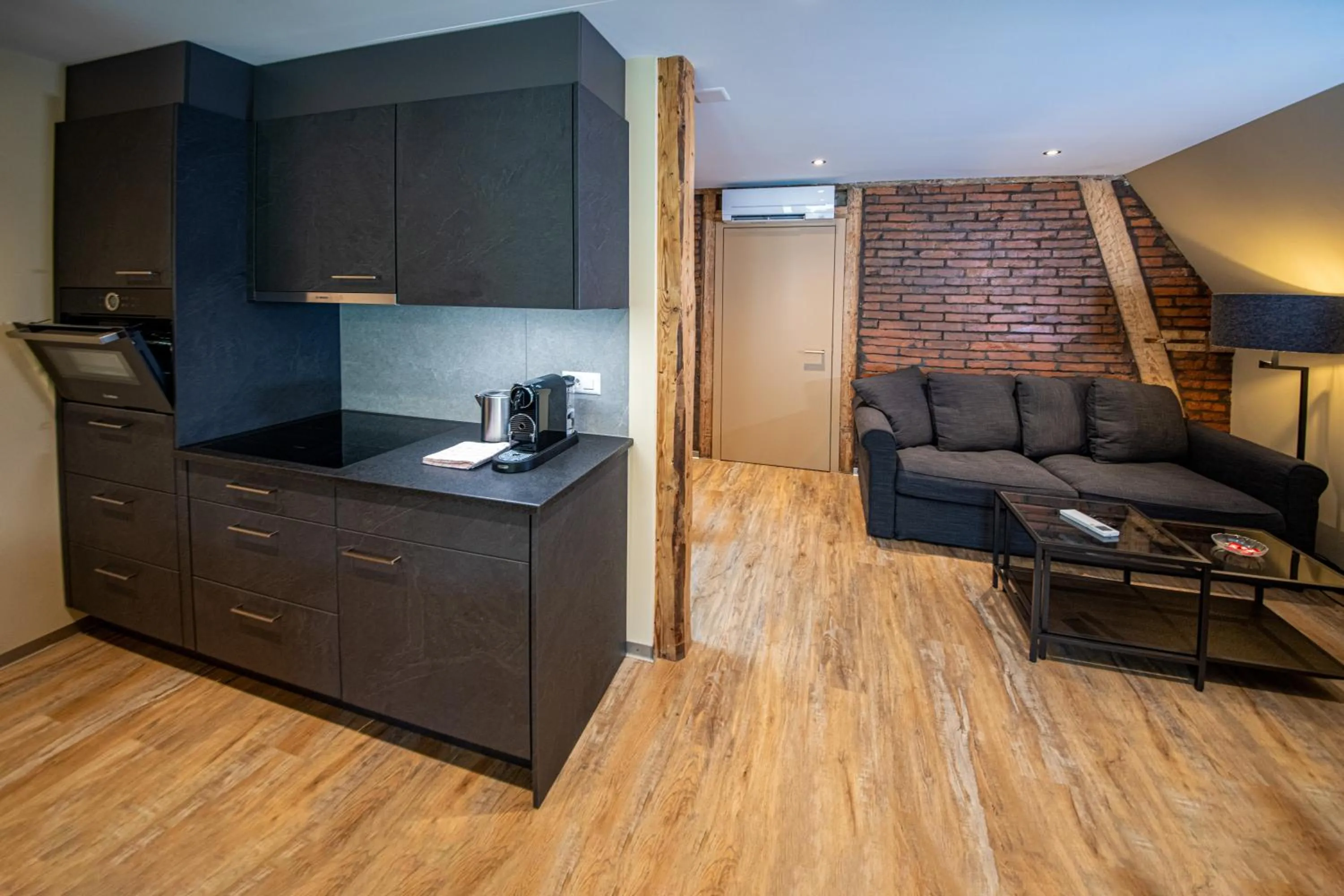 Kitchen or kitchenette in Swiss Inn & Apartments