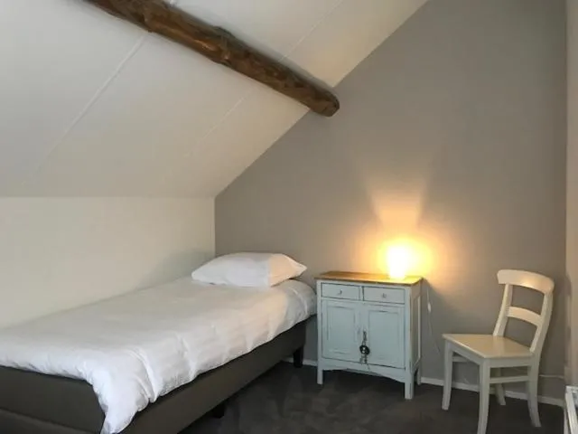 Bed in Hotel Hoeve de Plei