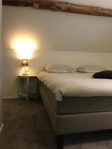 Bed in Hotel Hoeve de Plei