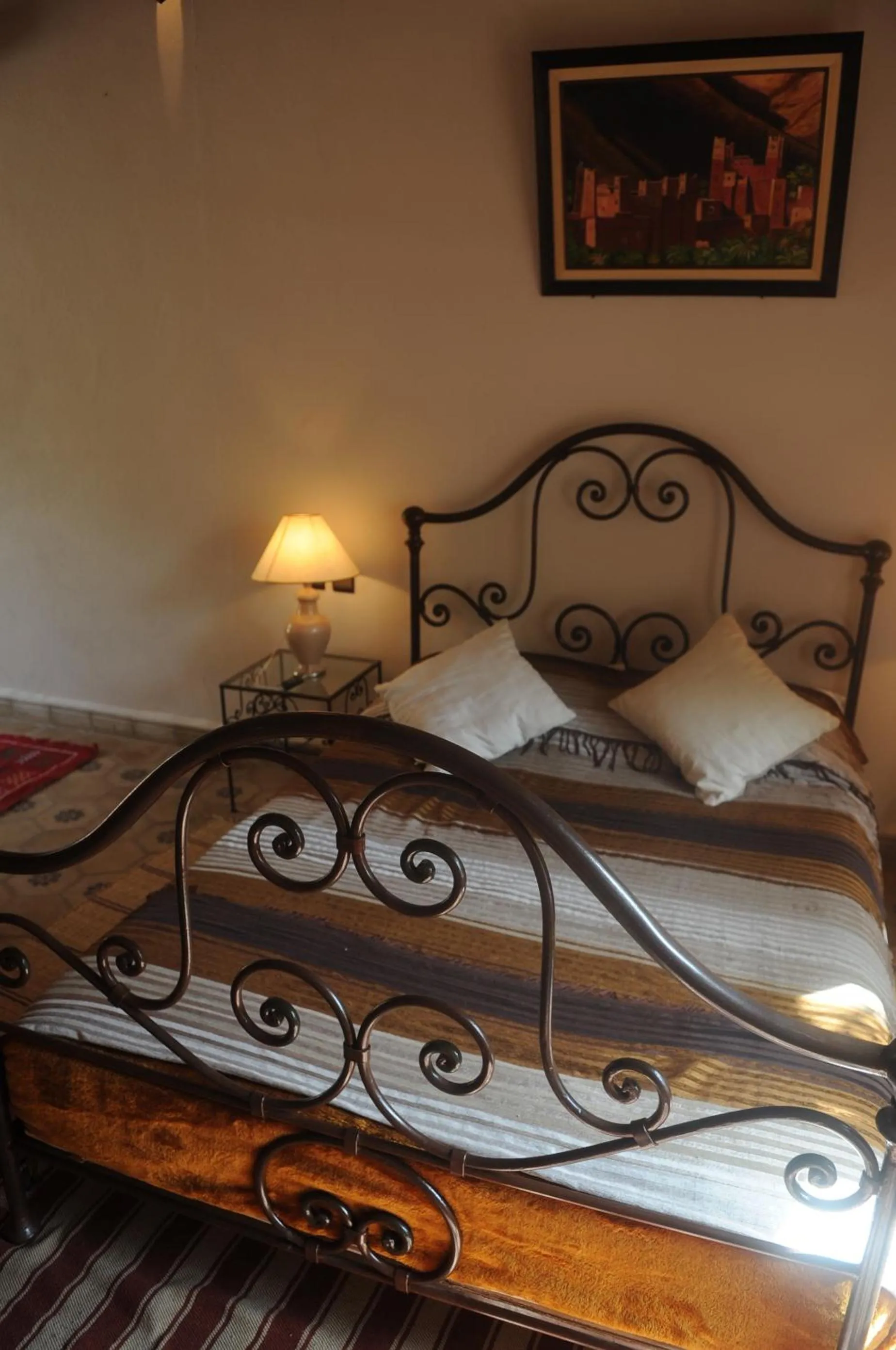 Bedroom, Bed in Auberge Chez Momo II