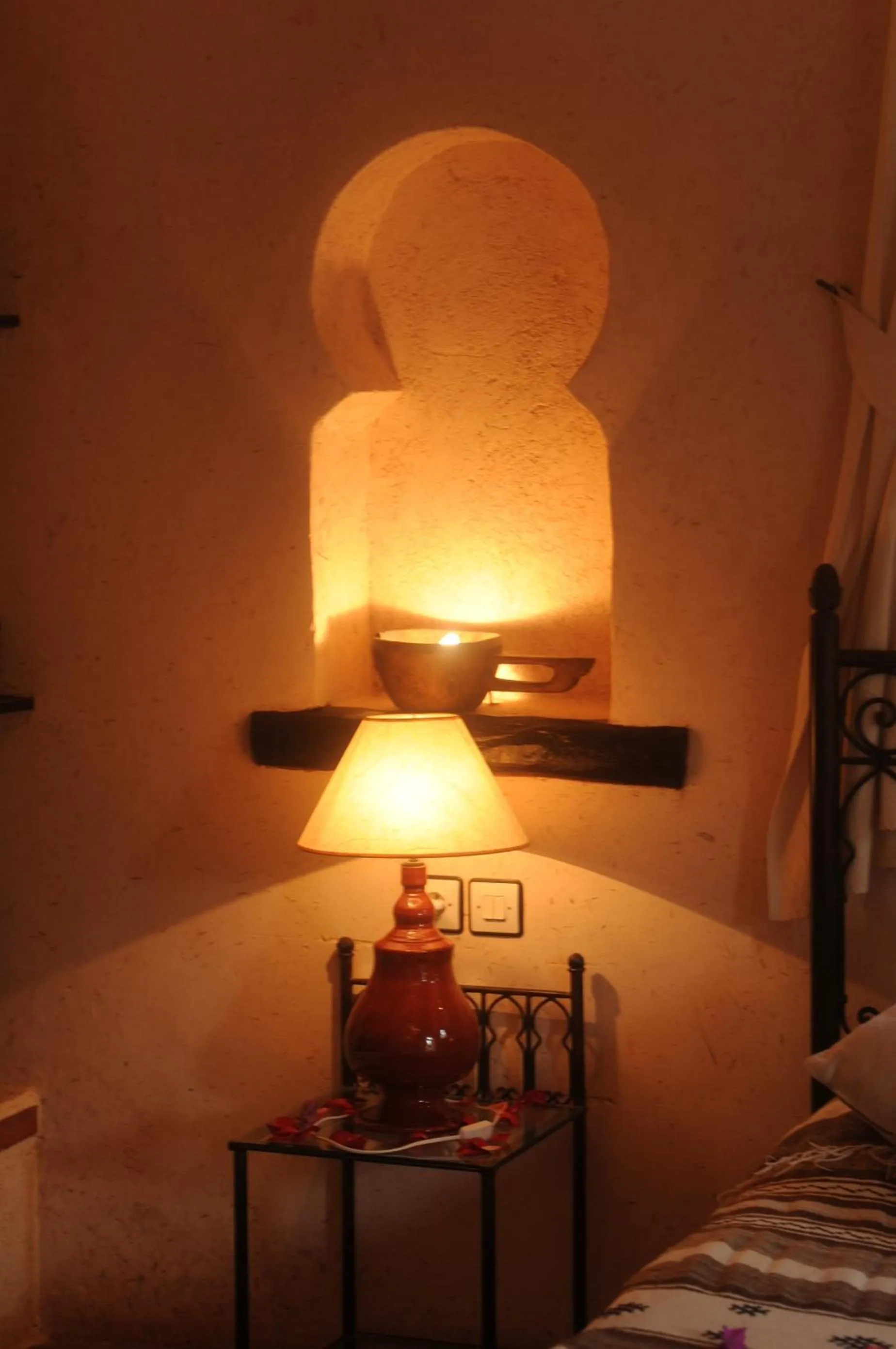 Decorative detail, Bed in Auberge Chez Momo II