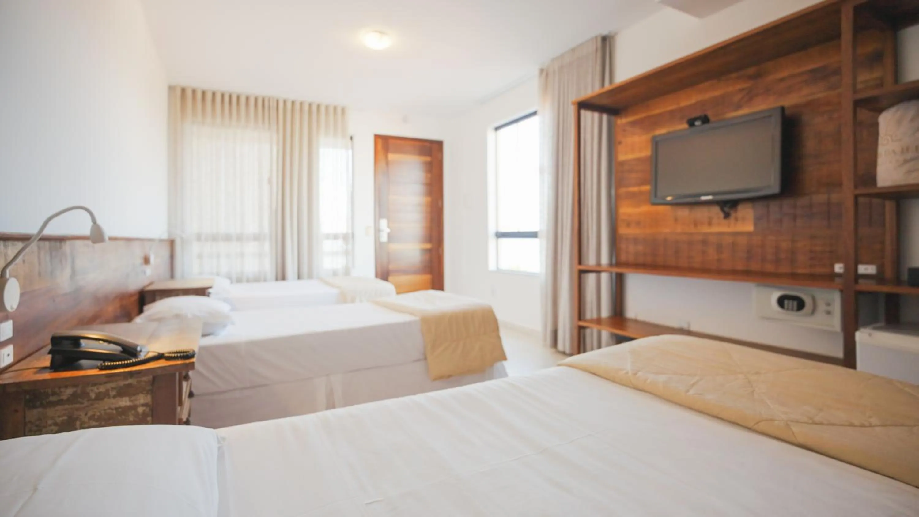 Bed in Pousada Pedra da Ilha