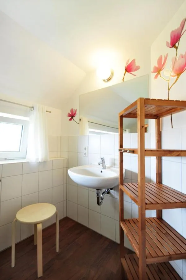 Bathroom, Bed in Bergoase Panorama-Apartments
