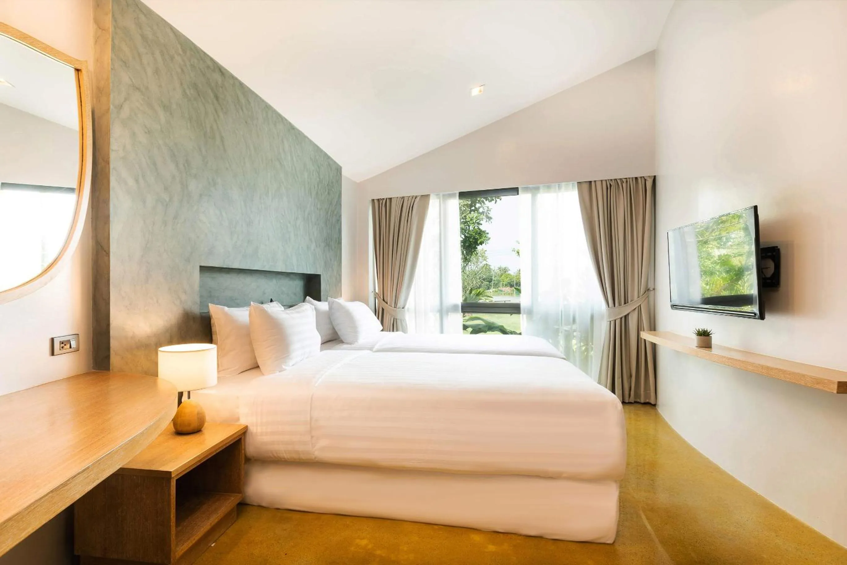 Bedroom, Bed in Na Tree Tara Riverside Resort Amphawa Damnoensaduak