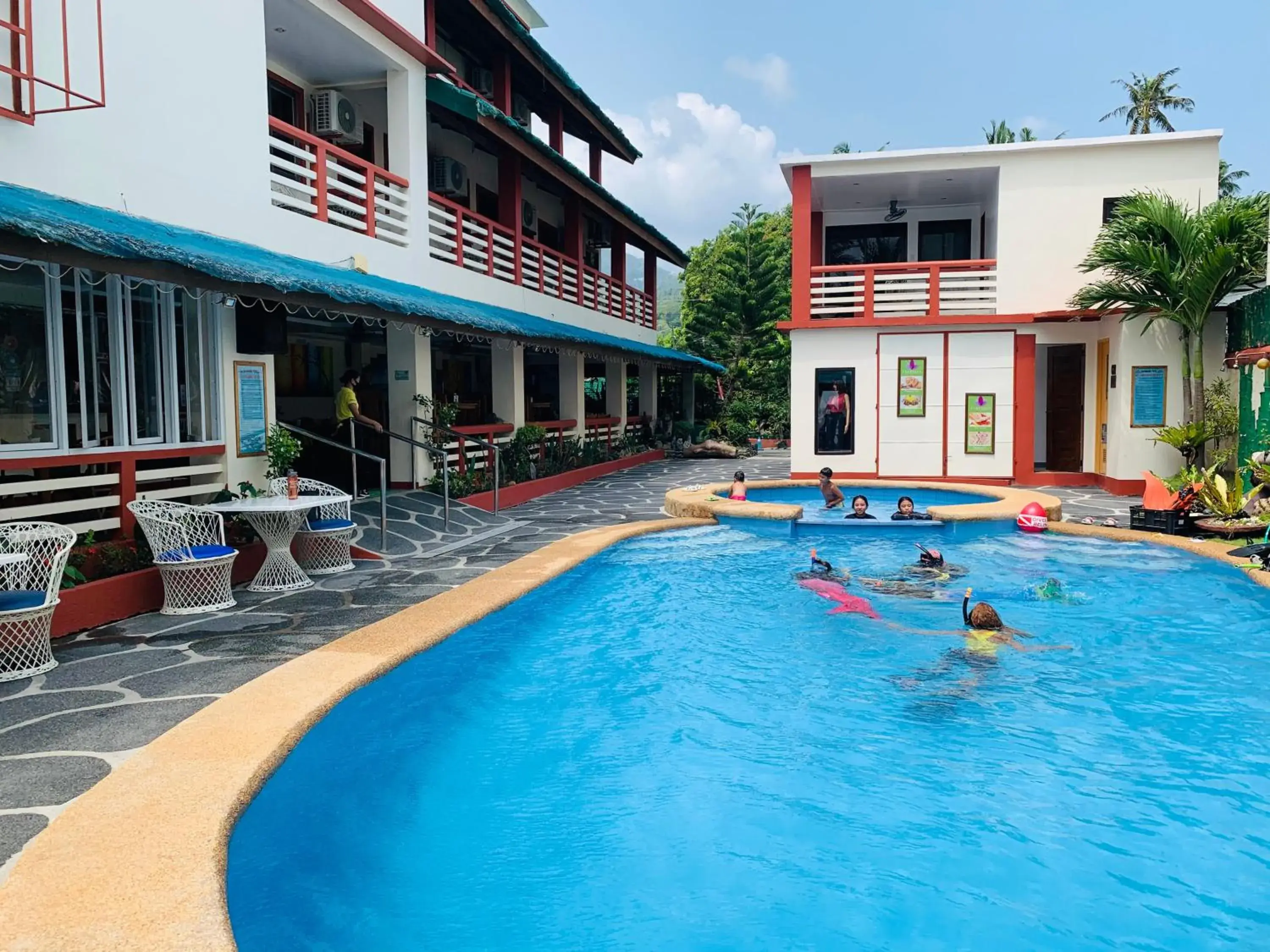 Swimming pool in Badladz Beach and Dive Resort Swimming pool in Badladz Beach and Dive Resort