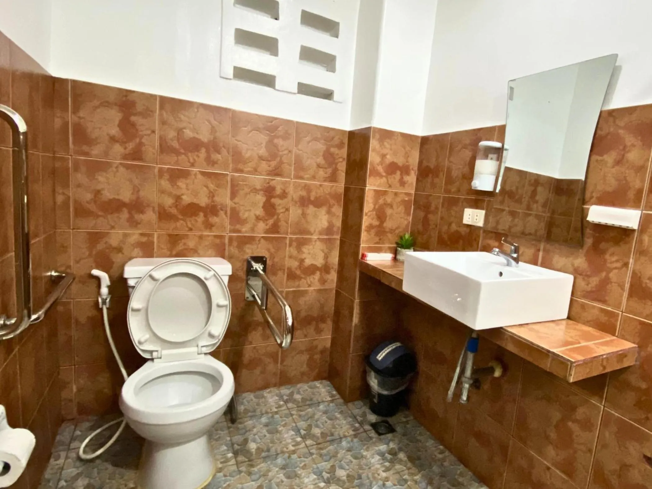 Toilet in Badladz Beach and Dive Resort