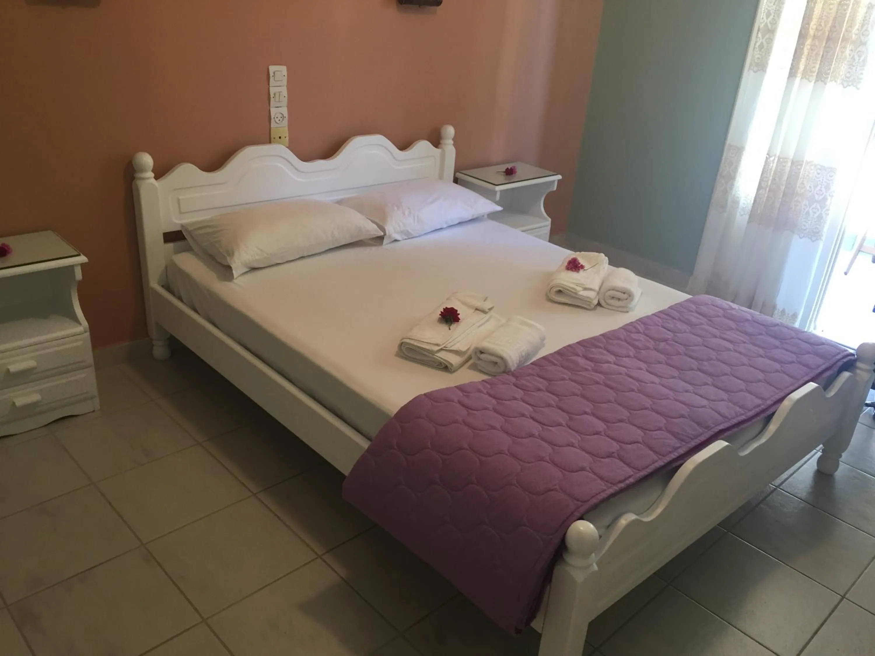 Bed in Georgakis George Rooms