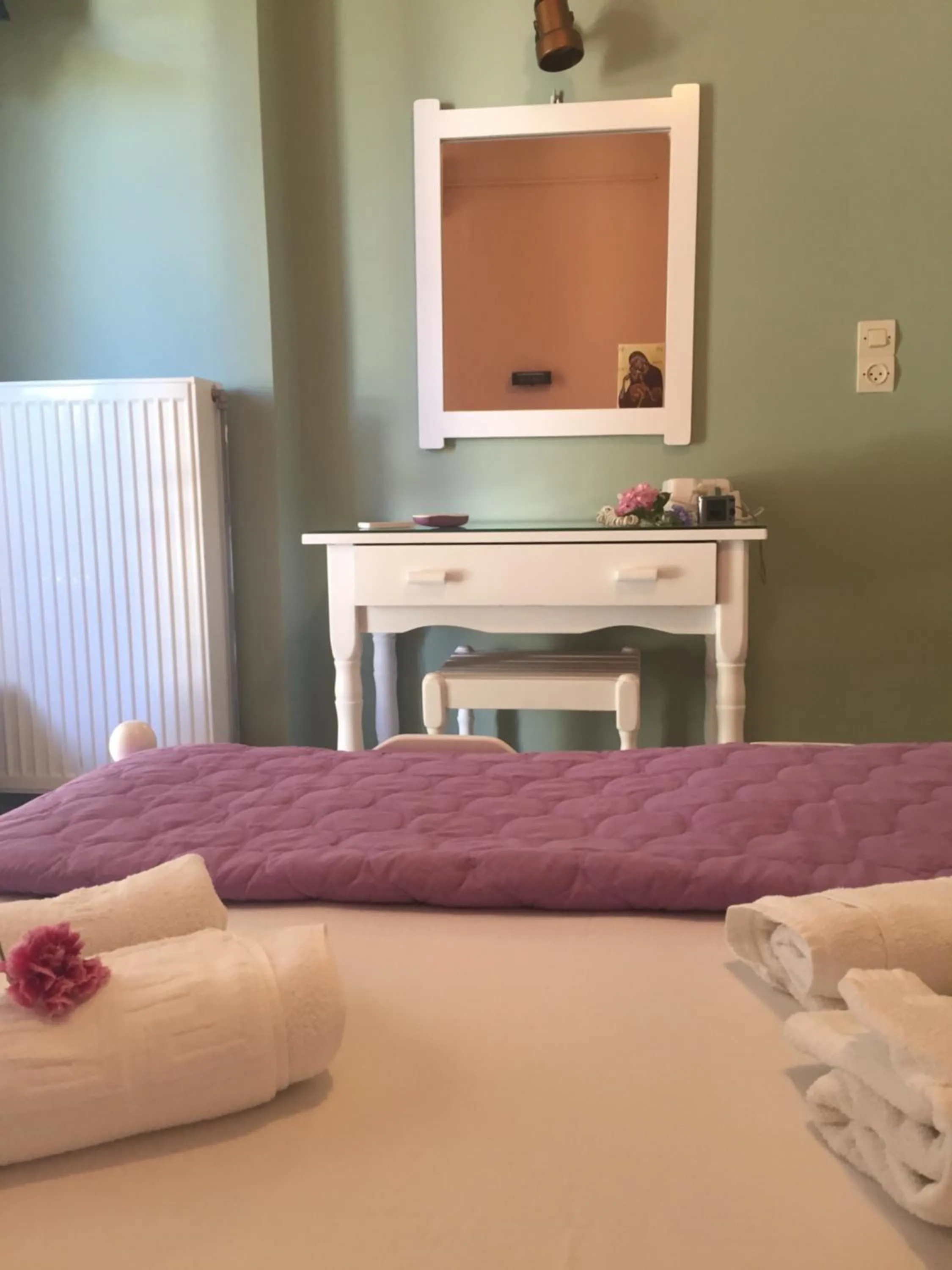 Bed in Georgakis George Rooms