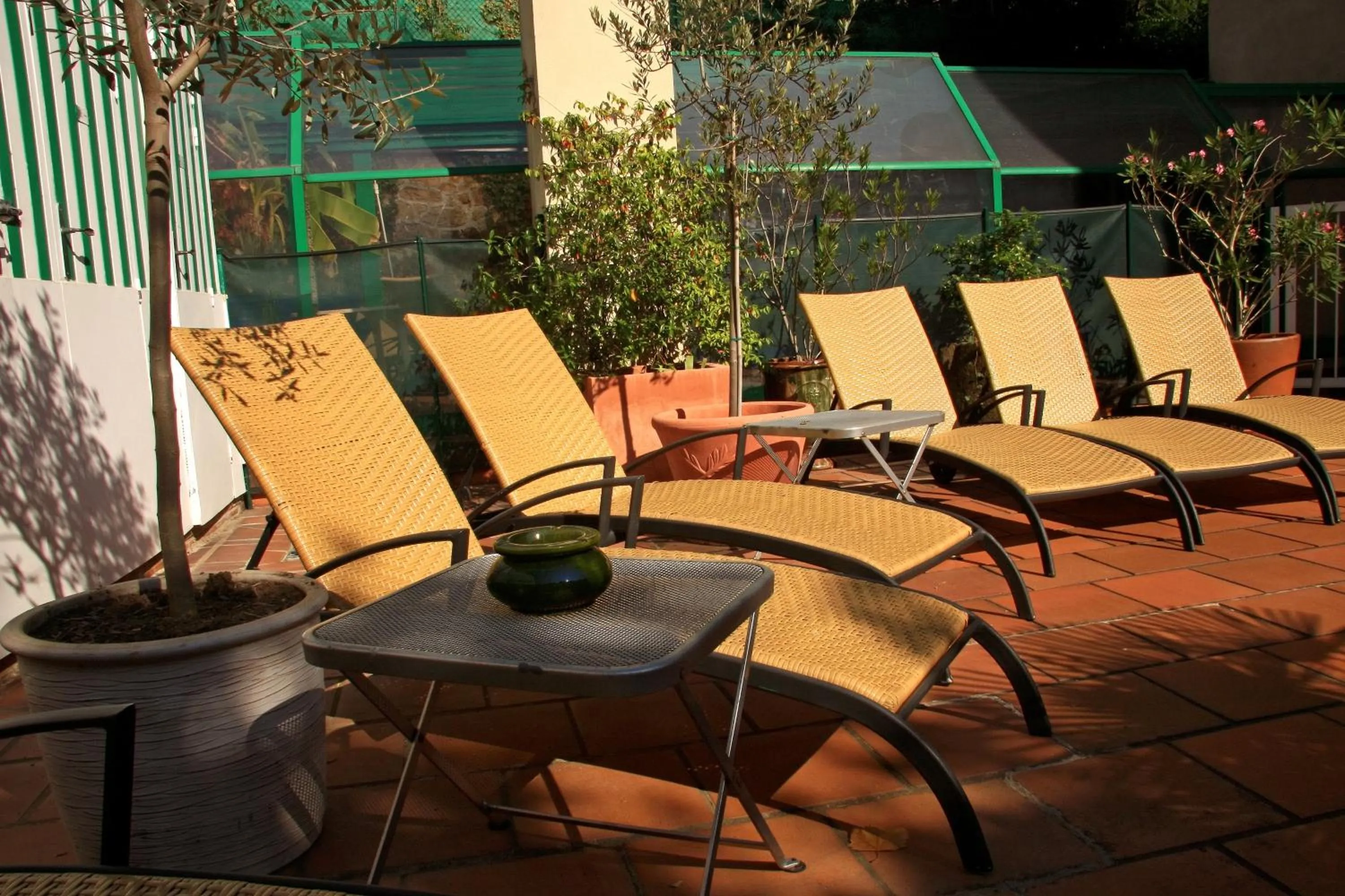 Swimming pool in Logis Hôtel Restaurant Grand Hôtel de Lyon