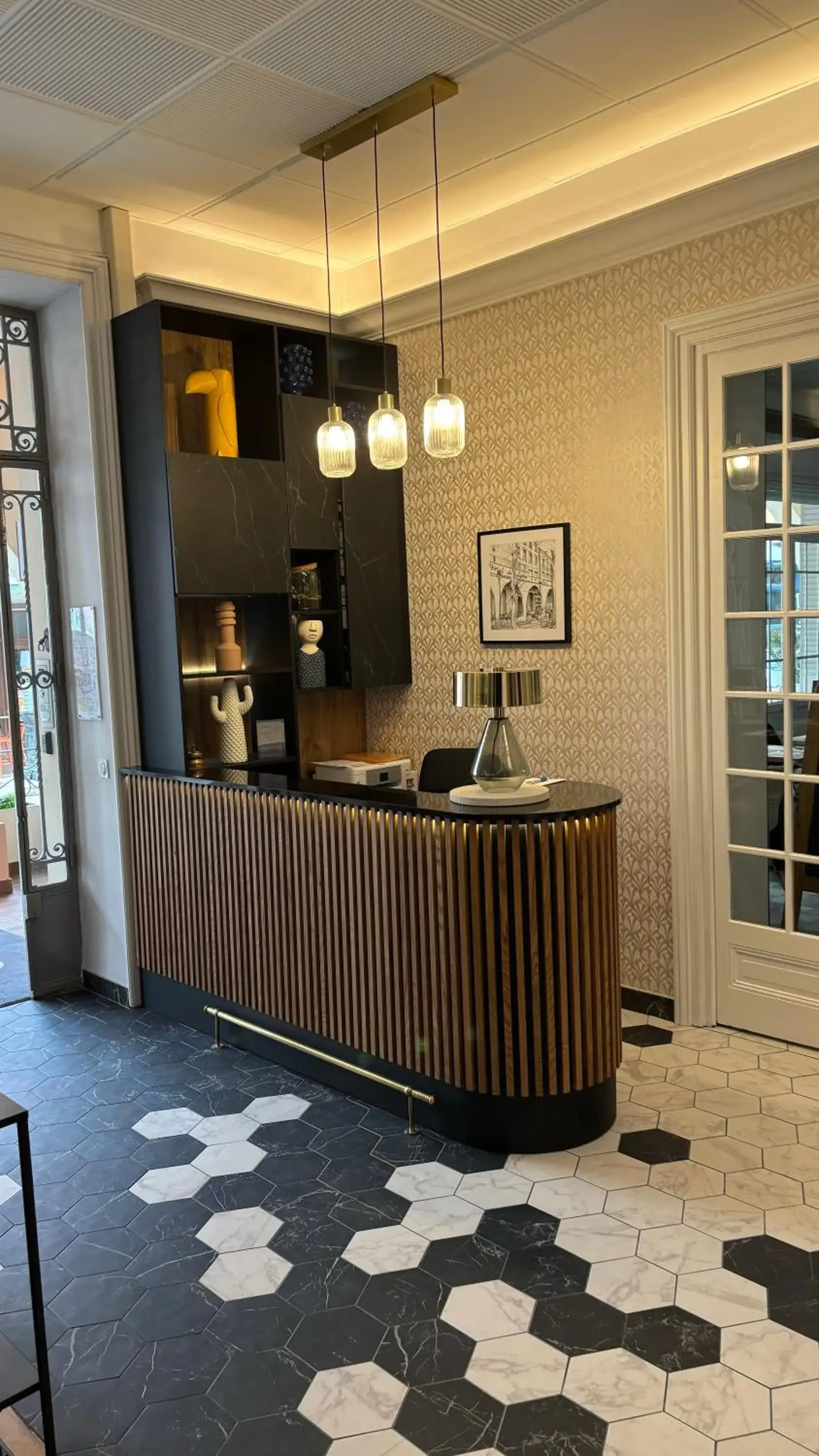 Lobby or reception in Logis Hôtel Restaurant Grand Hôtel de Lyon Lobby or reception in Logis Hôtel Restaurant Grand Hôtel de Lyon