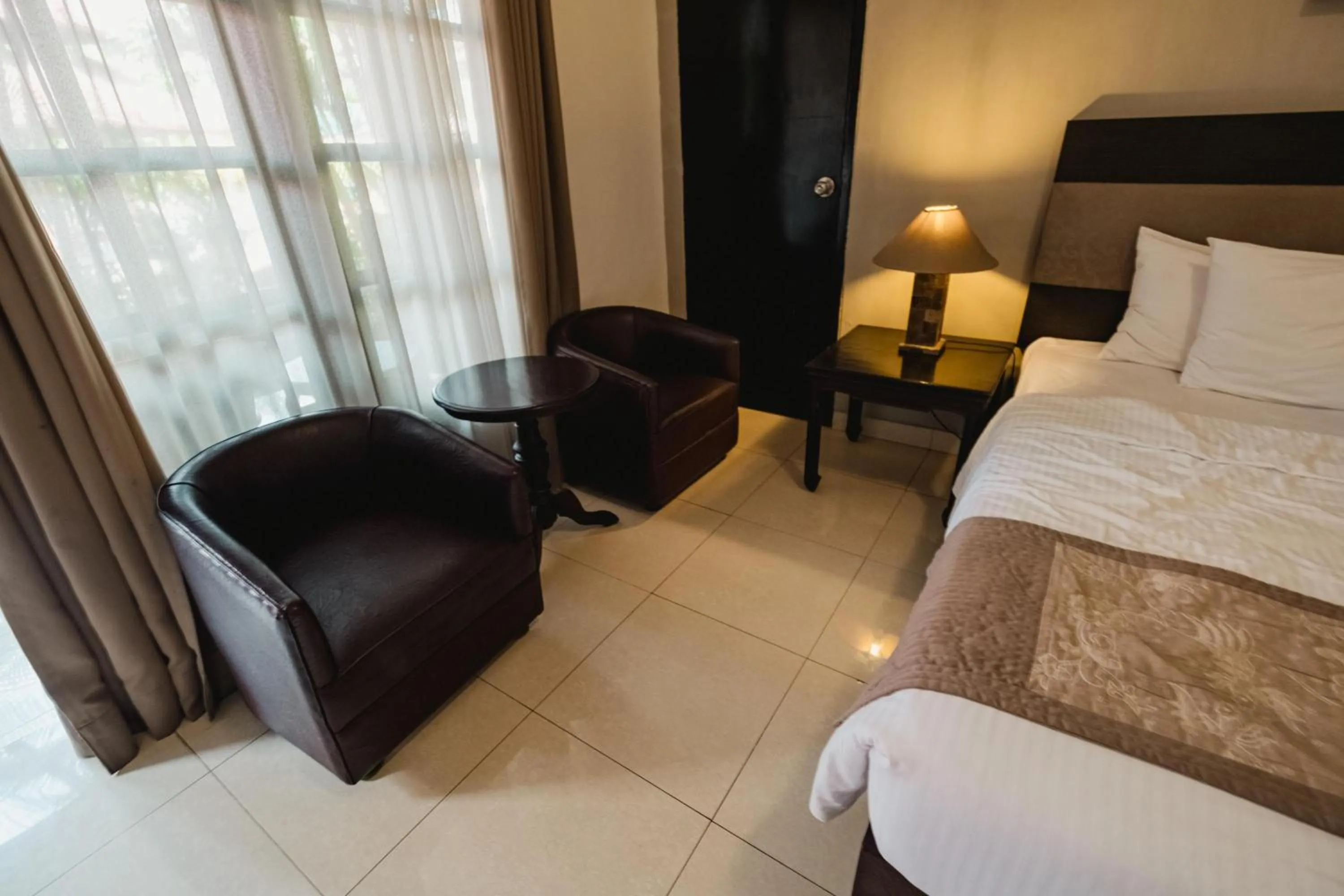 Bed in Sarinande Hotel