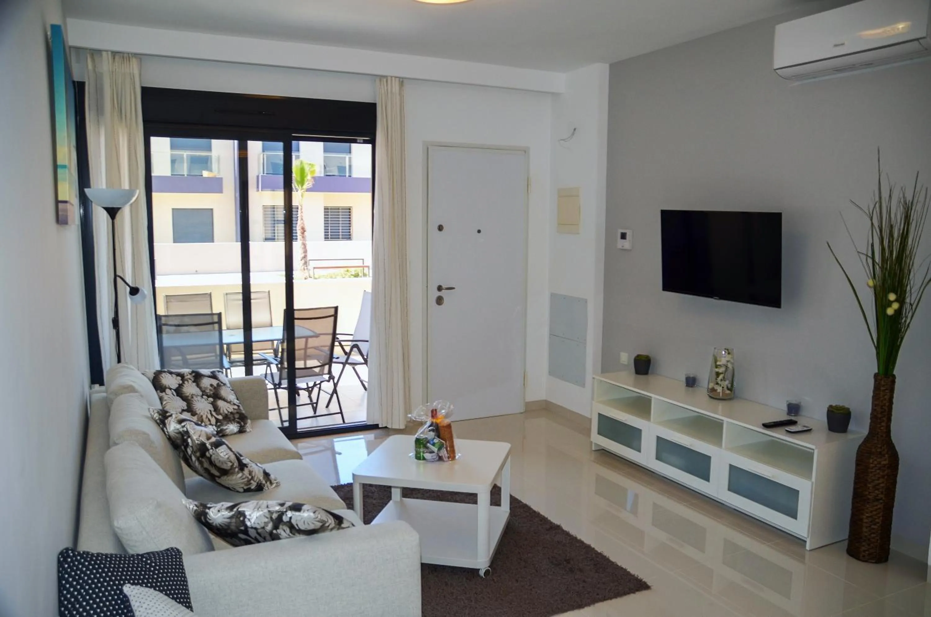 Communal lounge/ TV room in Higuericas Beach Apartment