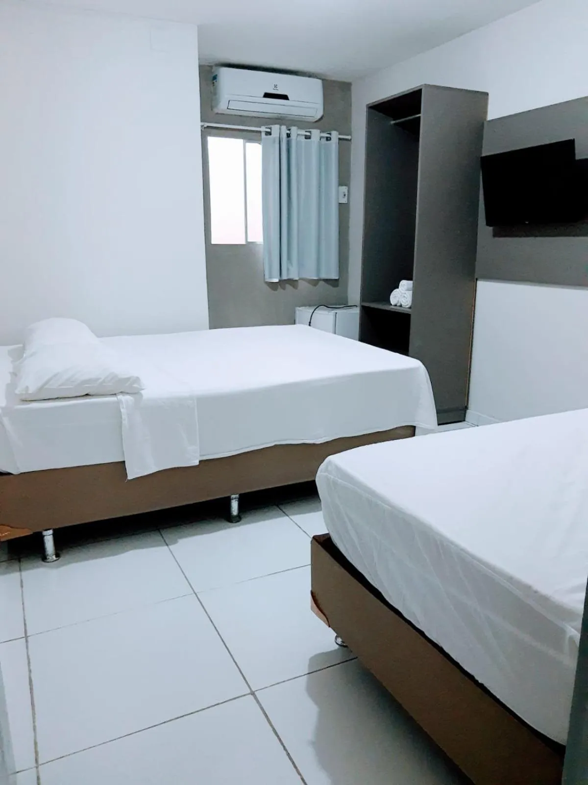 Bed in Pousada Tambaú