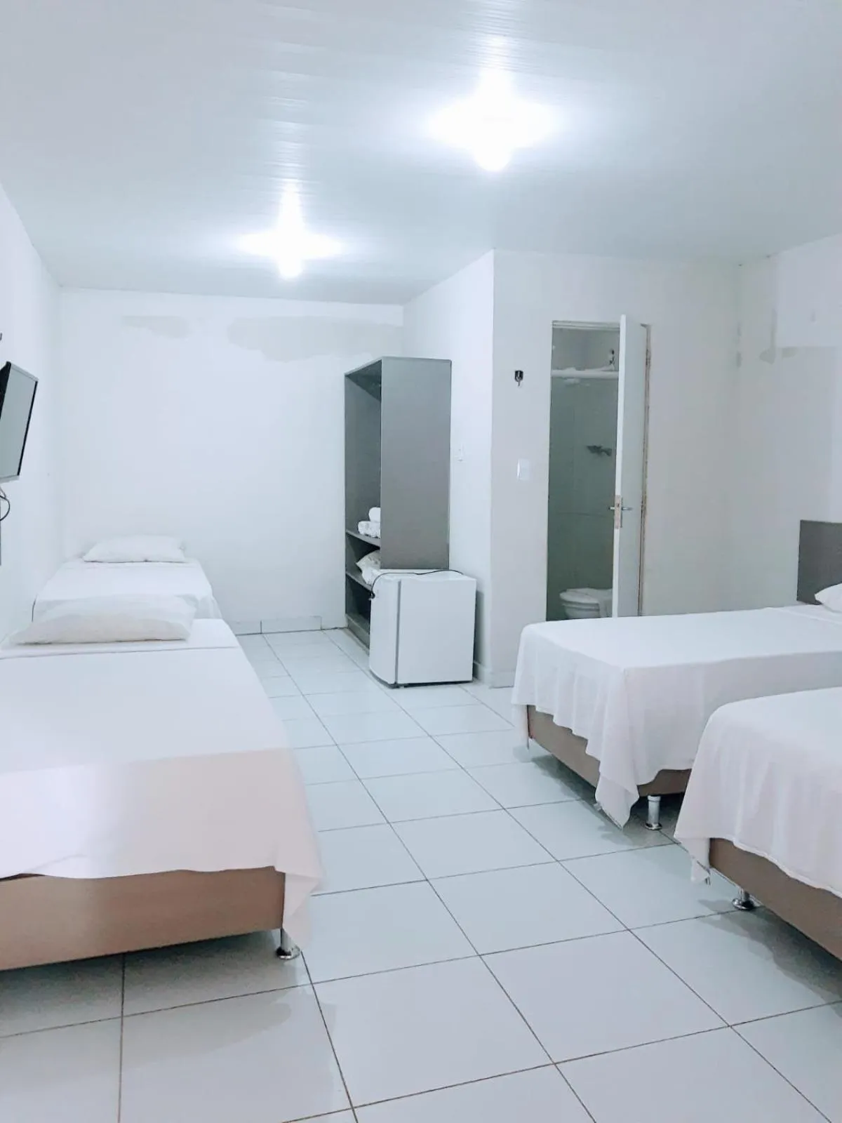 Bed in Pousada Tambaú