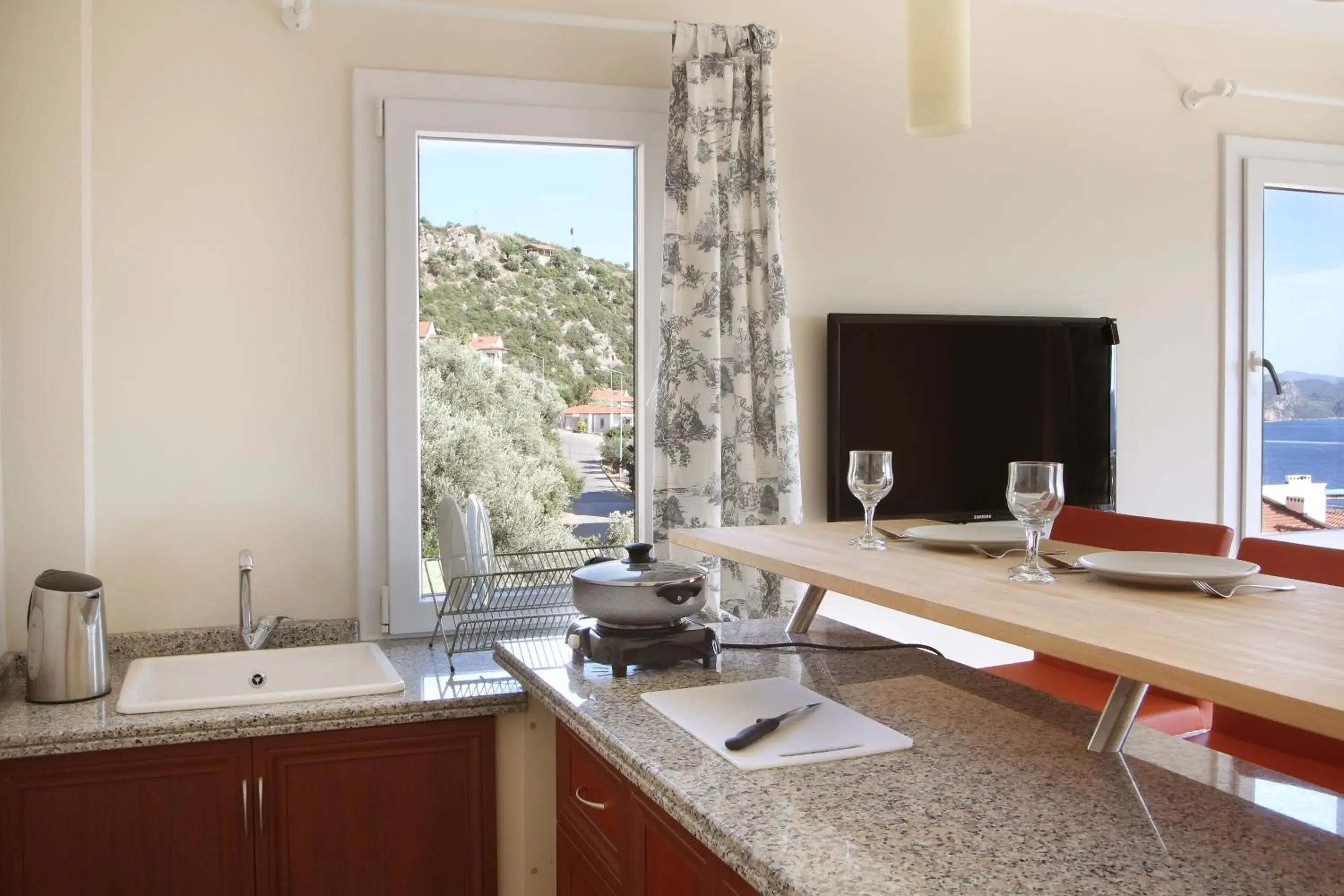 Kitchen or kitchenette in Saylam Suites Kitchen or kitchenette in Saylam Suites