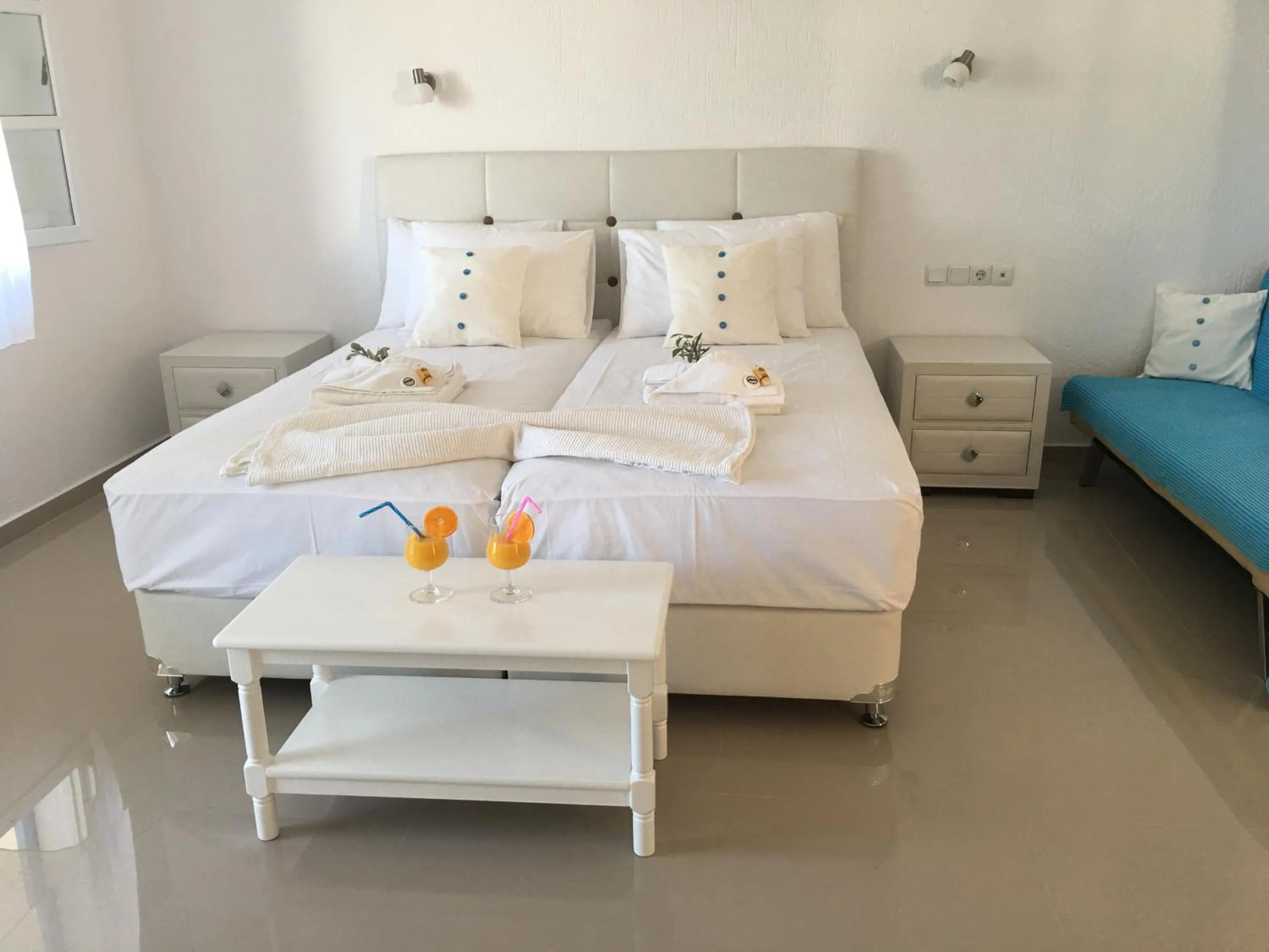 Bed in Limnionas Bay Village Hotel