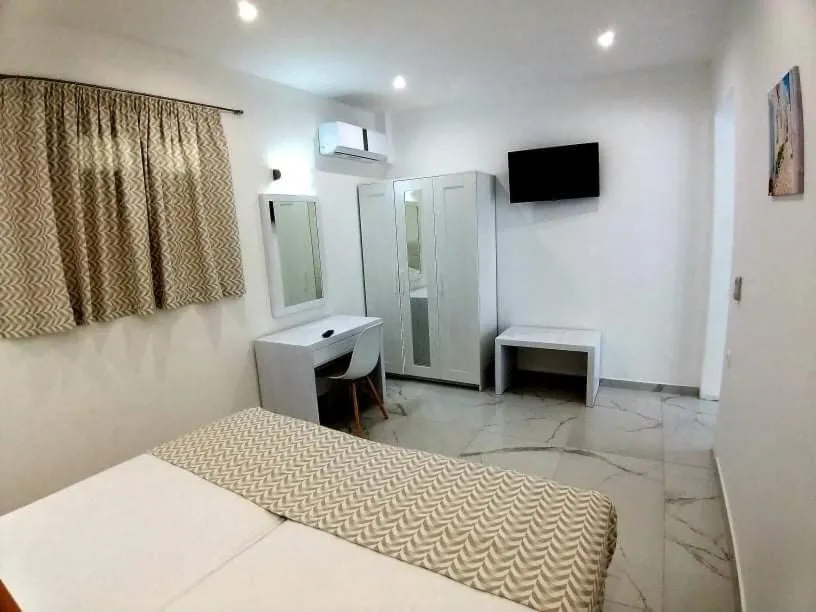 Bed in Limnionas Bay Village Hotel