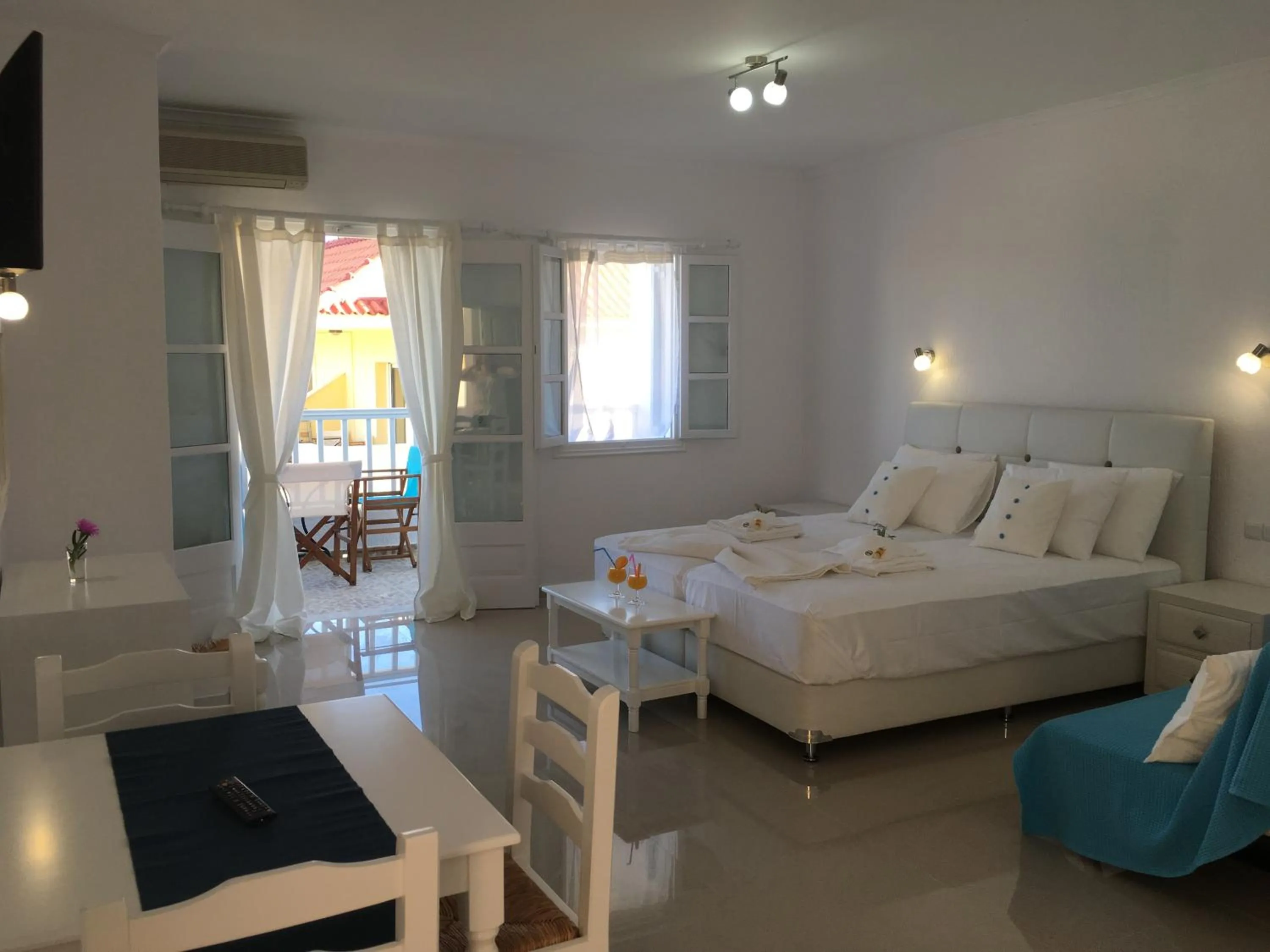 Bed in Limnionas Bay Village Hotel