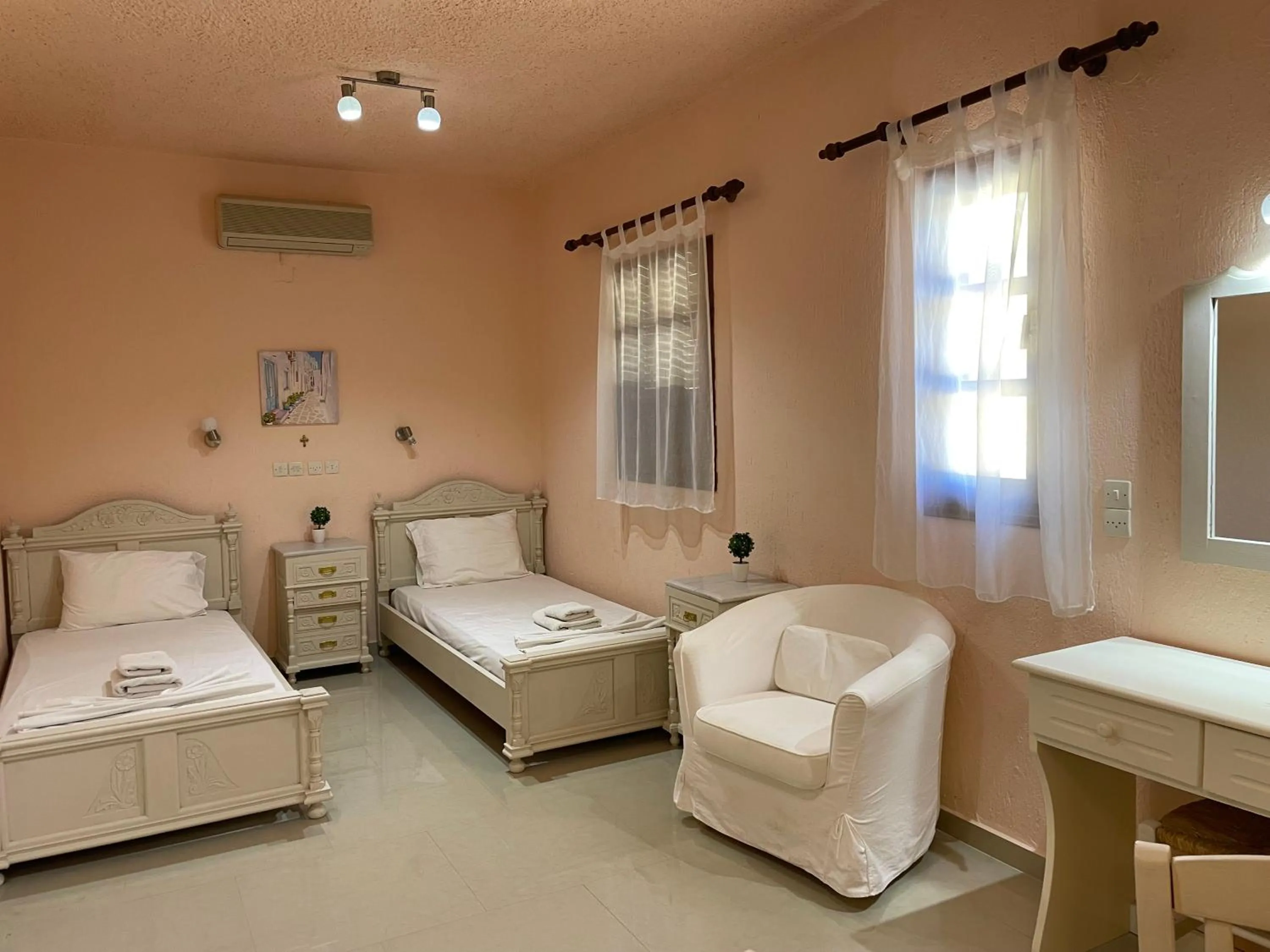 Bed in Limnionas Bay Village Hotel