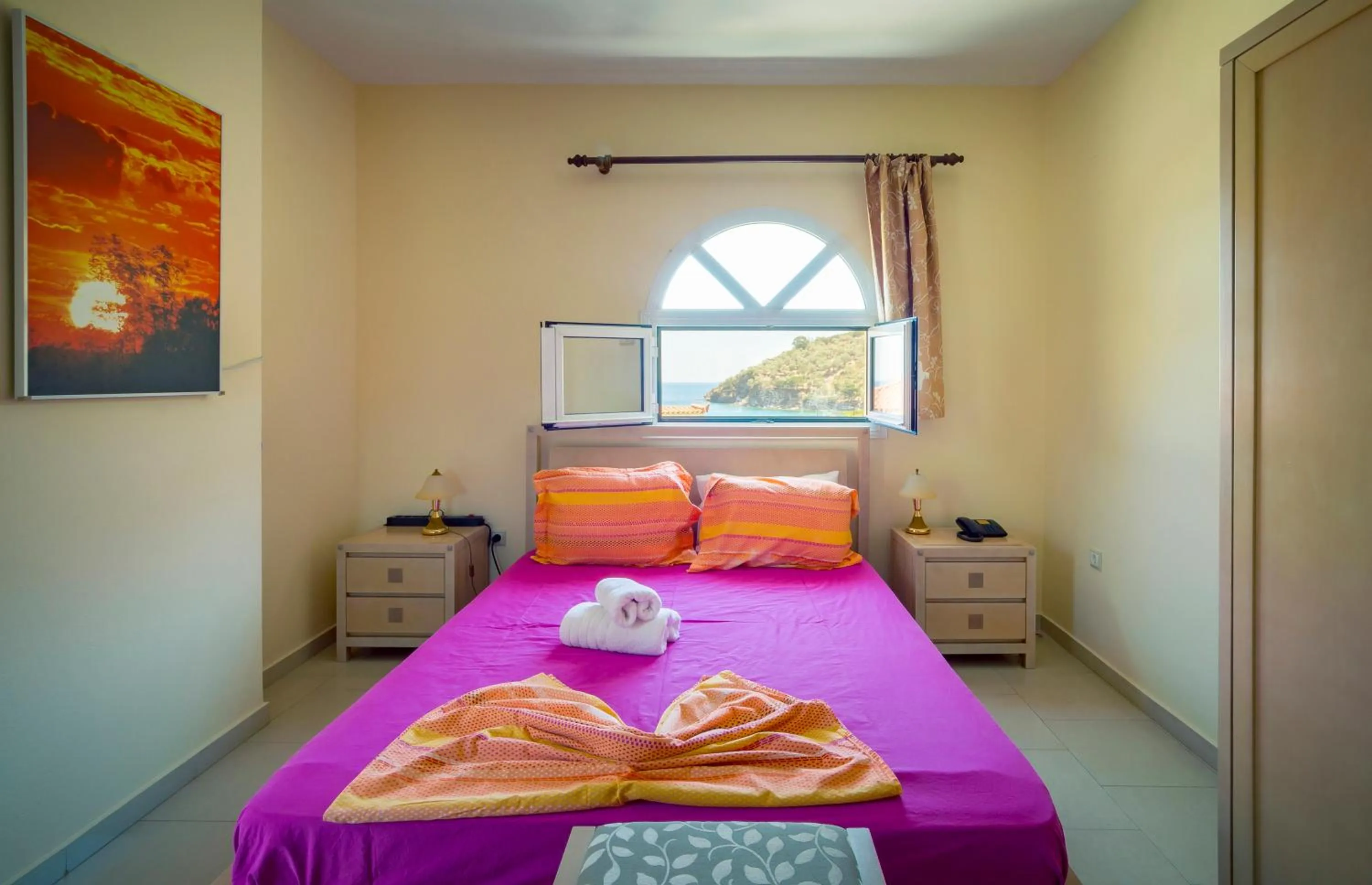 Bed in Limnionas Bay Village Hotel