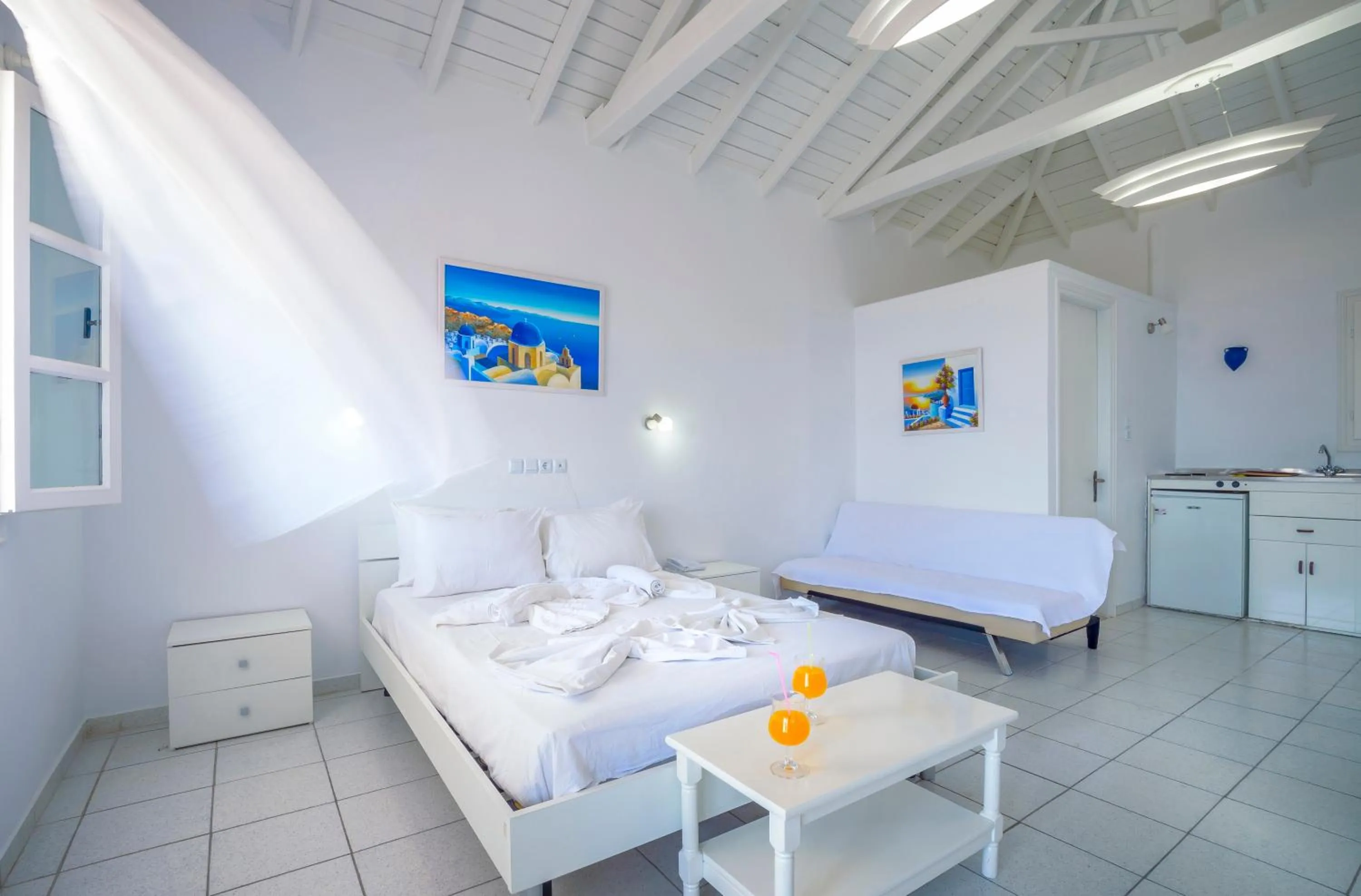 Bed in Limnionas Bay Village Hotel