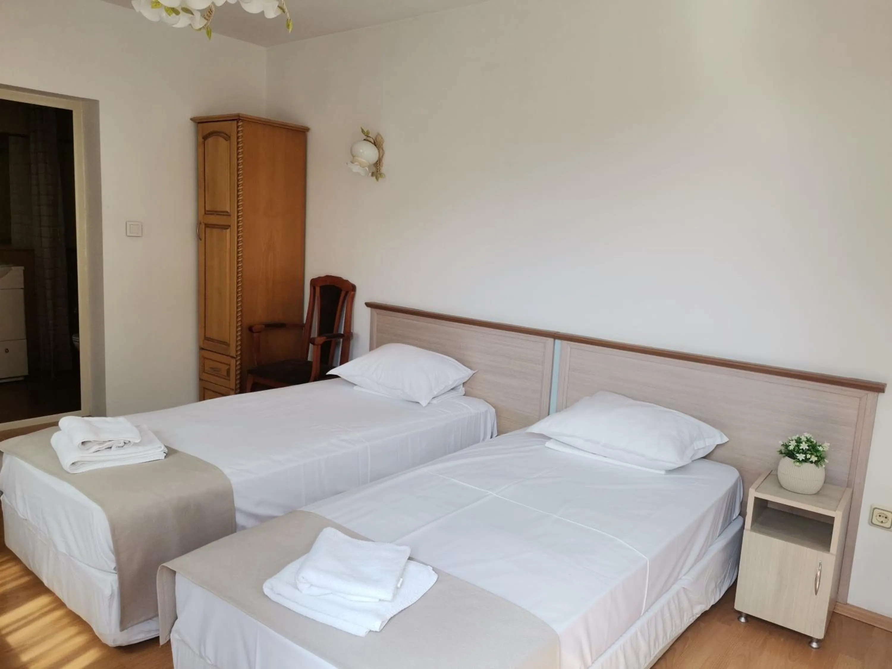 Bed in Family Hotel Rai