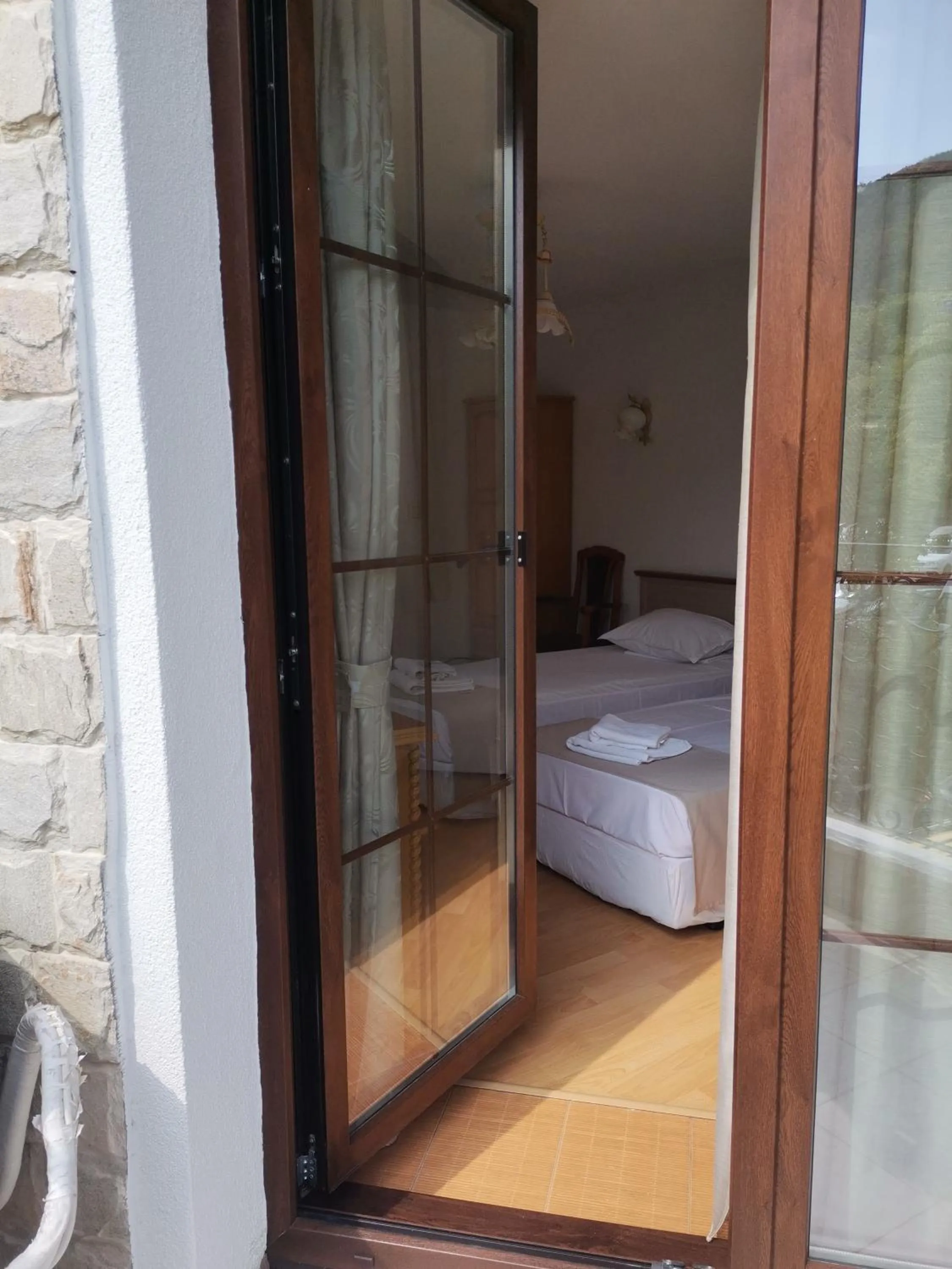 Bed in Family Hotel Rai