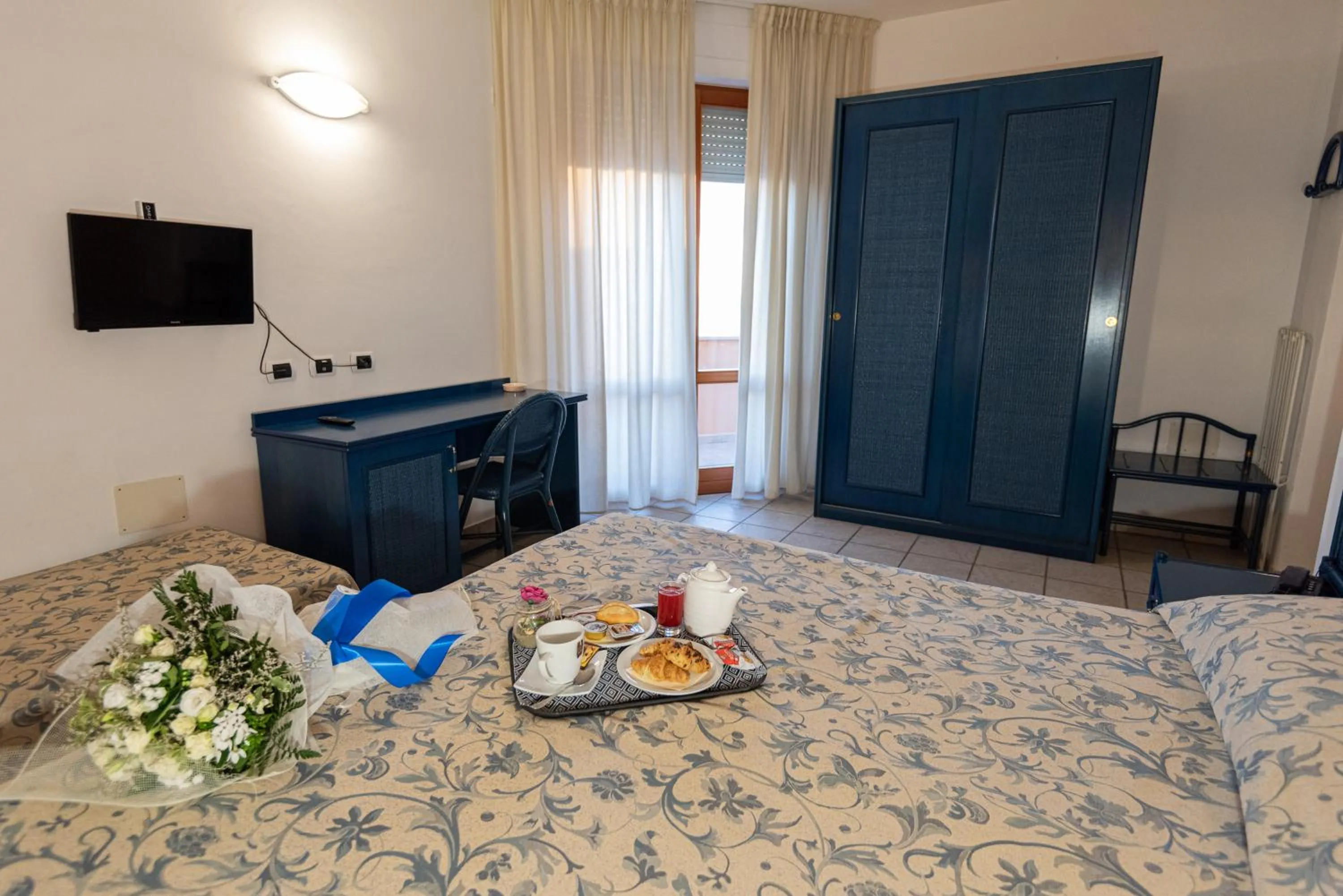 Bed in Hotel il Delfino