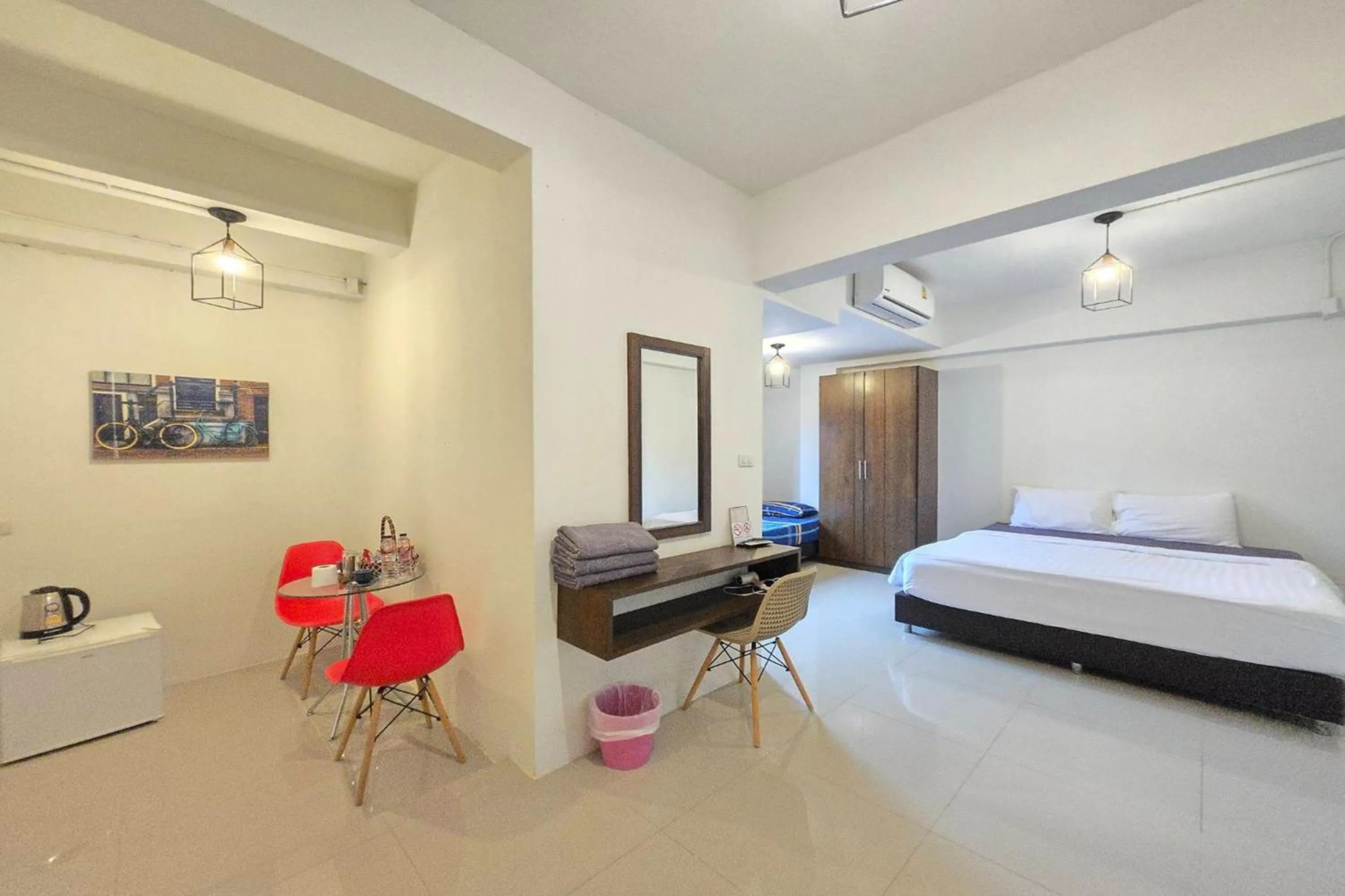 Bed in Hotel Wualai by CMStay