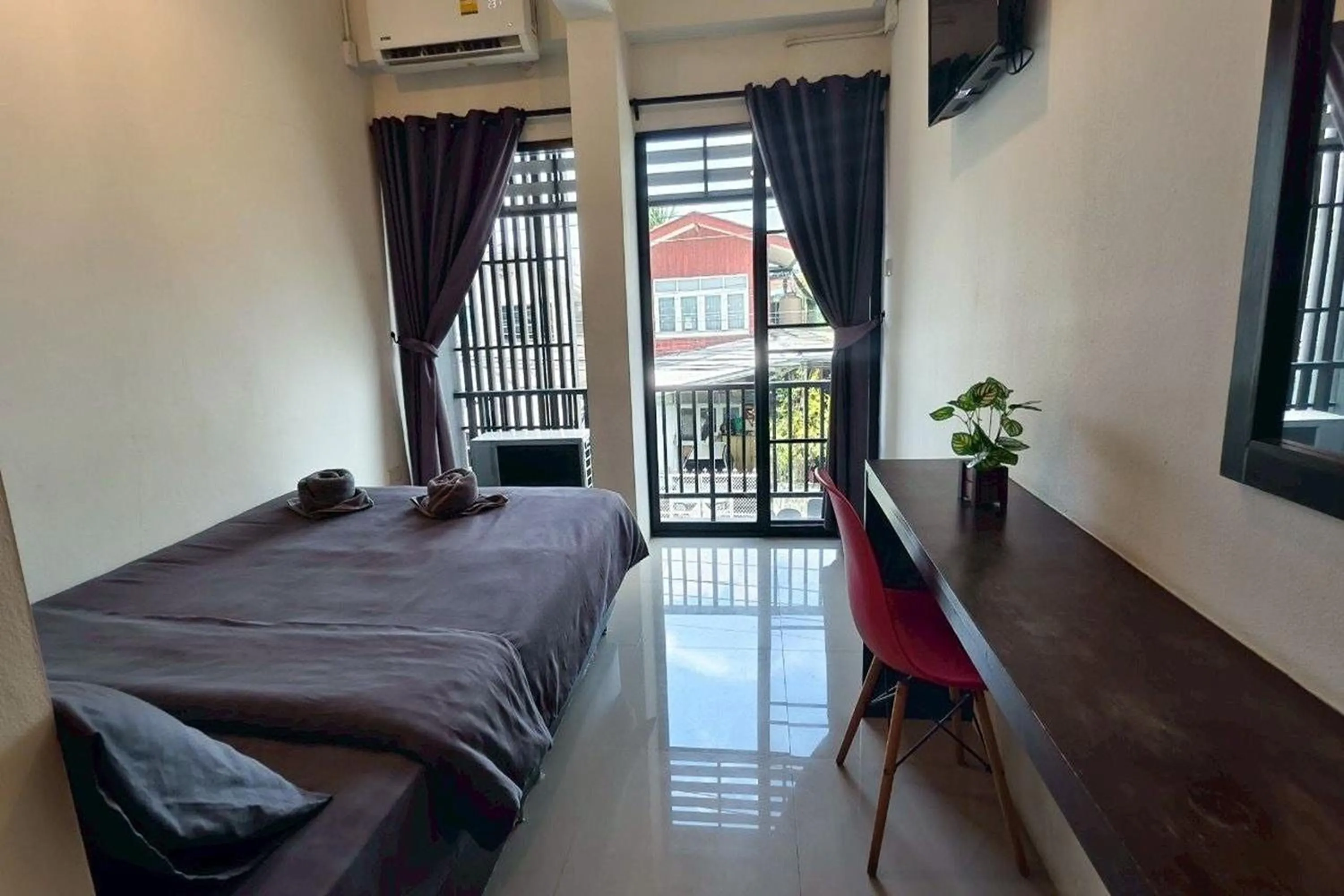 Bed in Hotel Wualai by CMStay