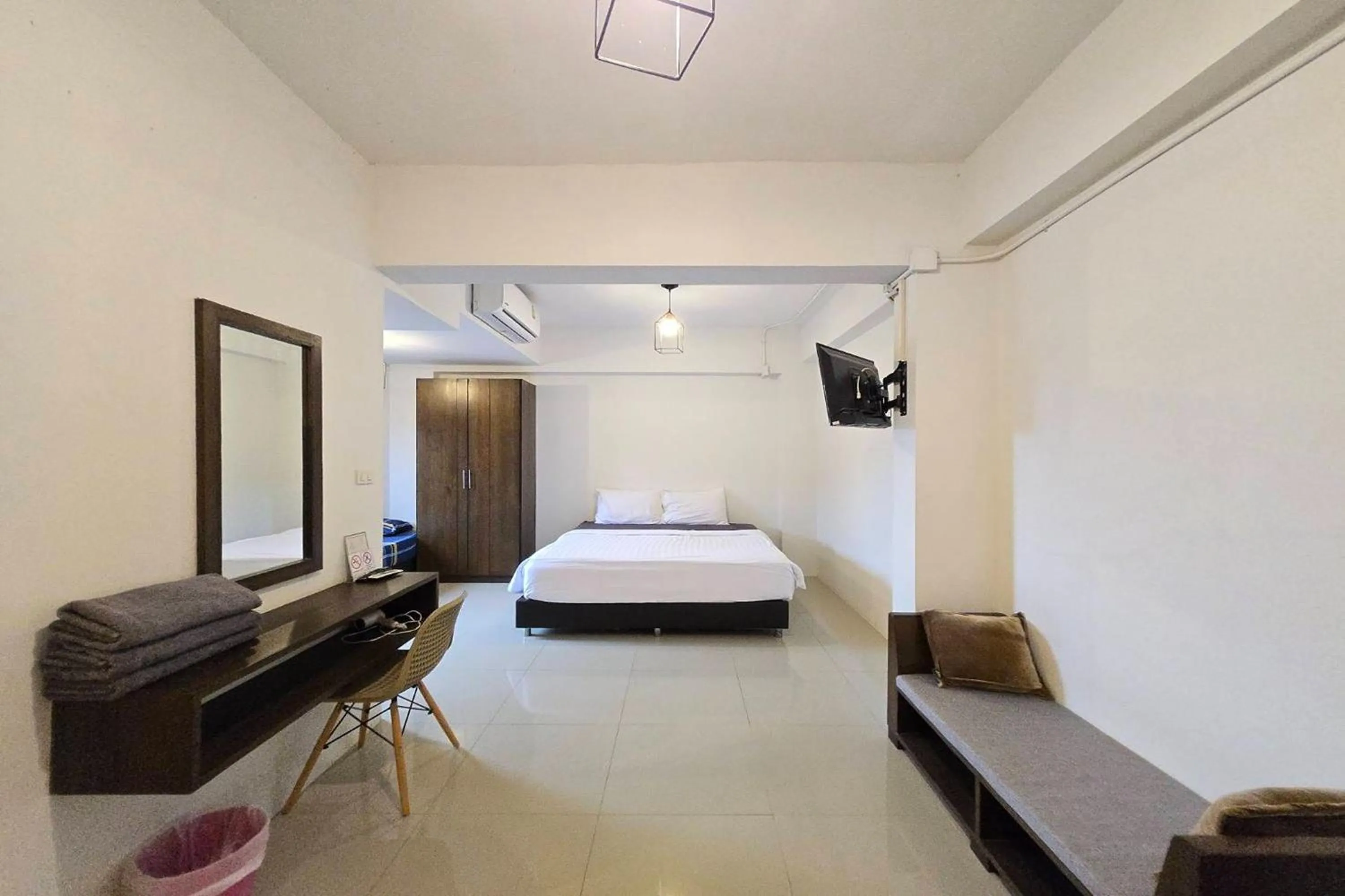 Bed in Hotel Wualai by CMStay