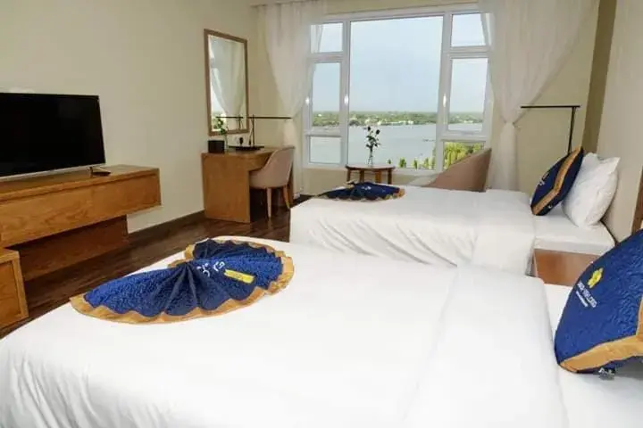 Bed in Khách sạn Sài Gòn Vĩnh Long Bed in Khách sạn Sài Gòn Vĩnh Long